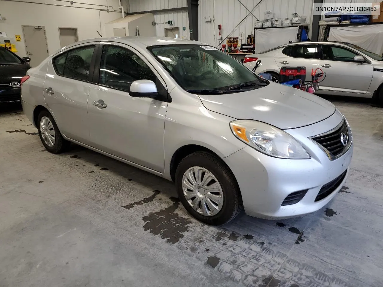 2012 Nissan Versa S VIN: 3N1CN7AP7CL833453 Lot: 78697224