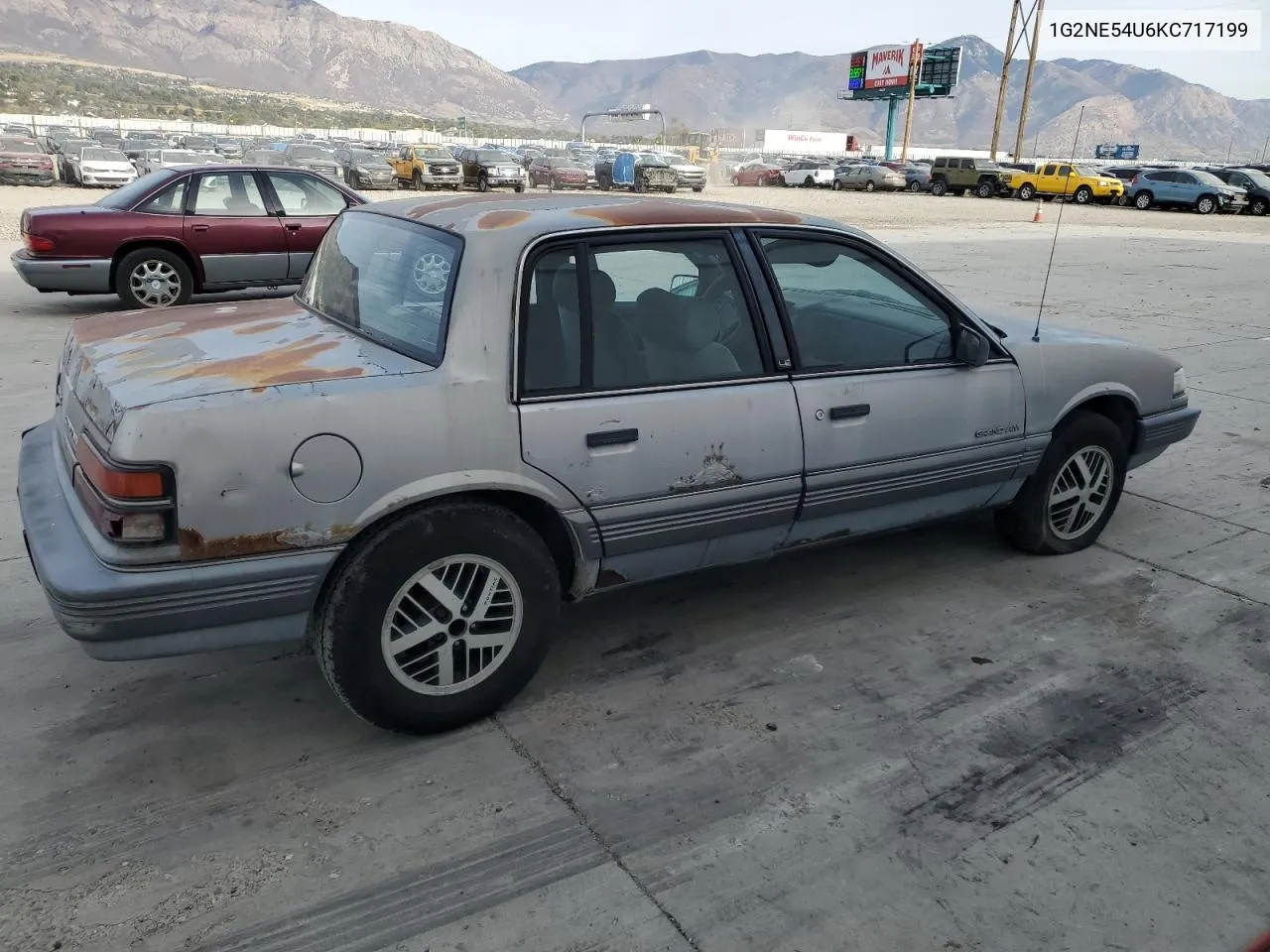 1989 Pontiac Grand Am Le VIN: 1G2NE54U6KC717199 Lot: 77552184