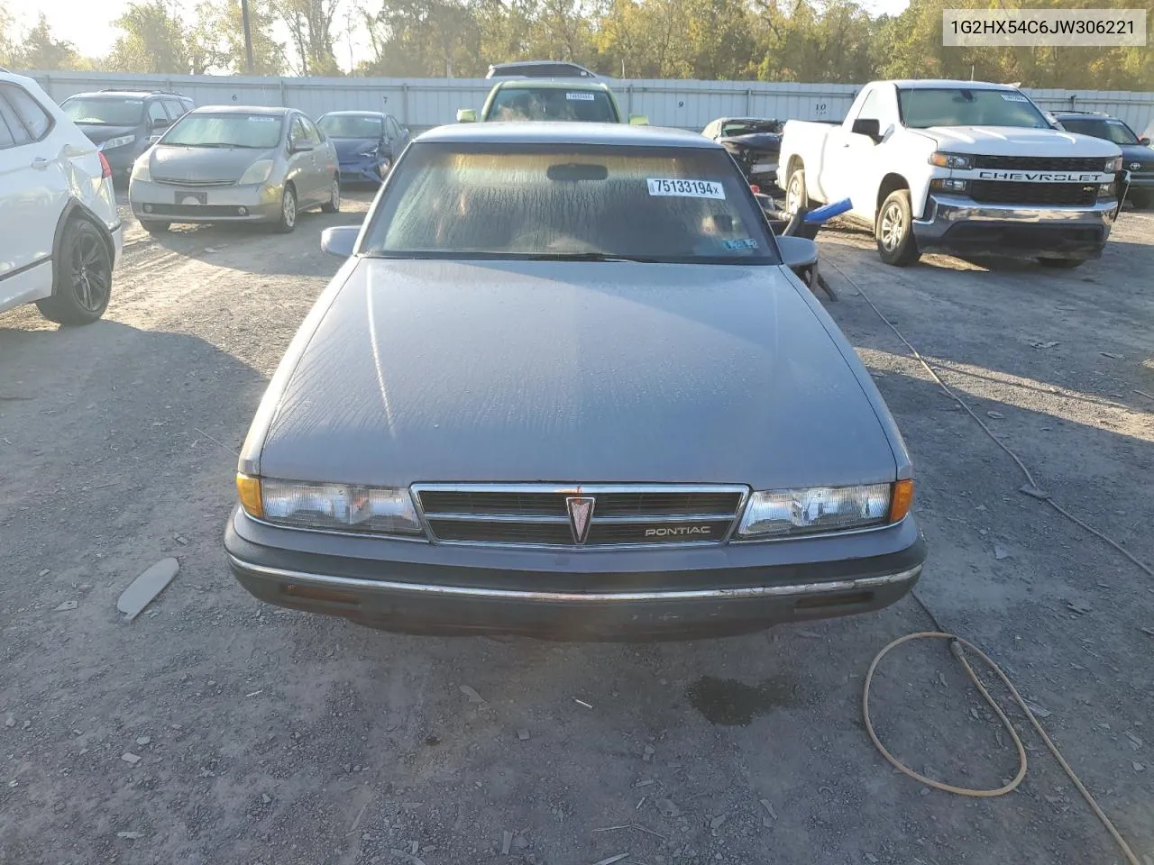 1988 Pontiac Bonneville Le VIN: 1G2HX54C6JW306221 Lot: 75133194