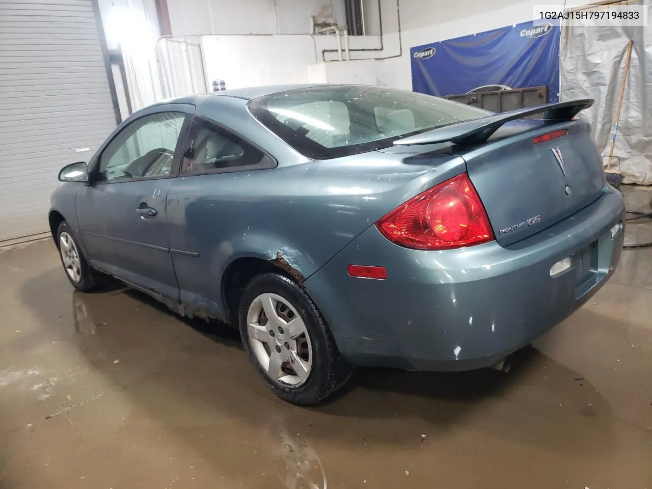 2009 Pontiac G5 VIN: 1G2AJ15H797194833 Lot: 77145444