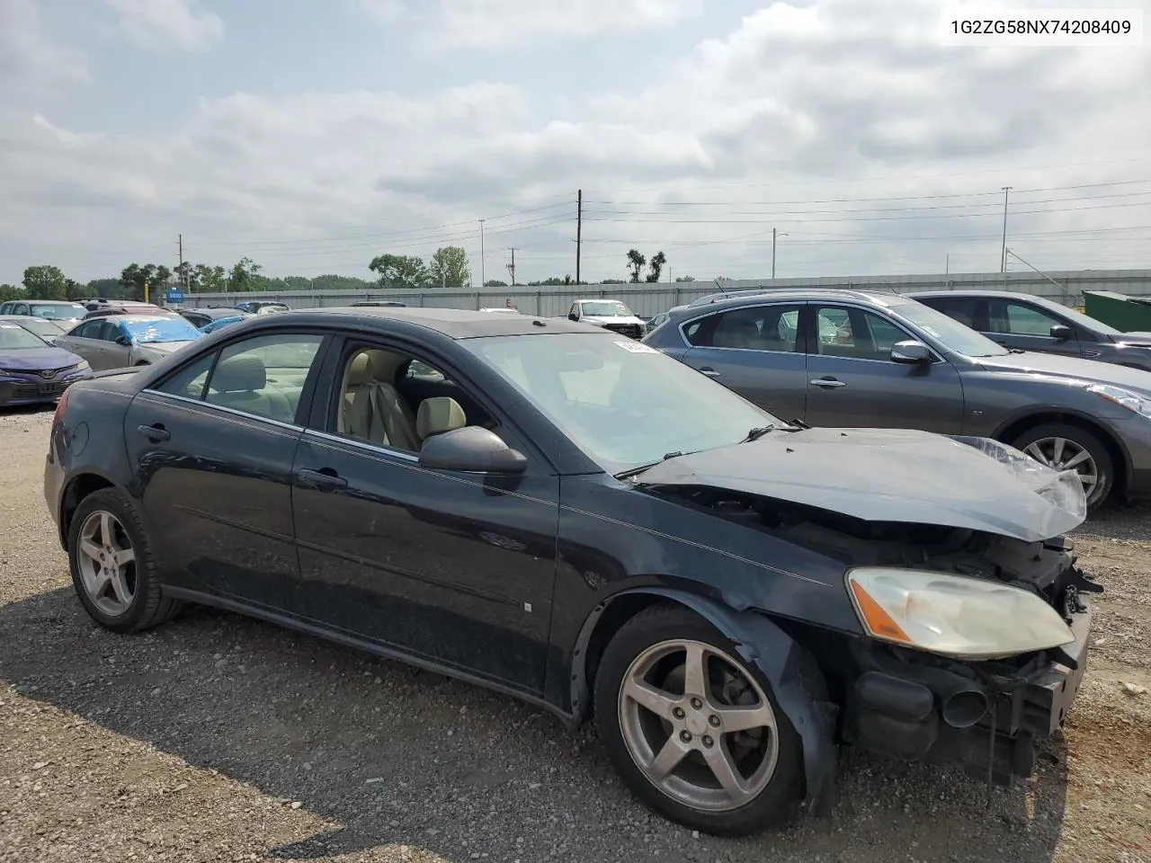 2007 Pontiac G6 Base VIN: 1G2ZG58NX74208409 Lot: 64634084