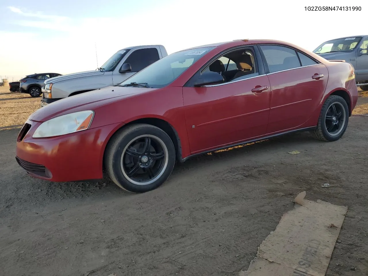 2007 Pontiac G6 Base VIN: 1G2ZG58N474131990 Lot: 71997654