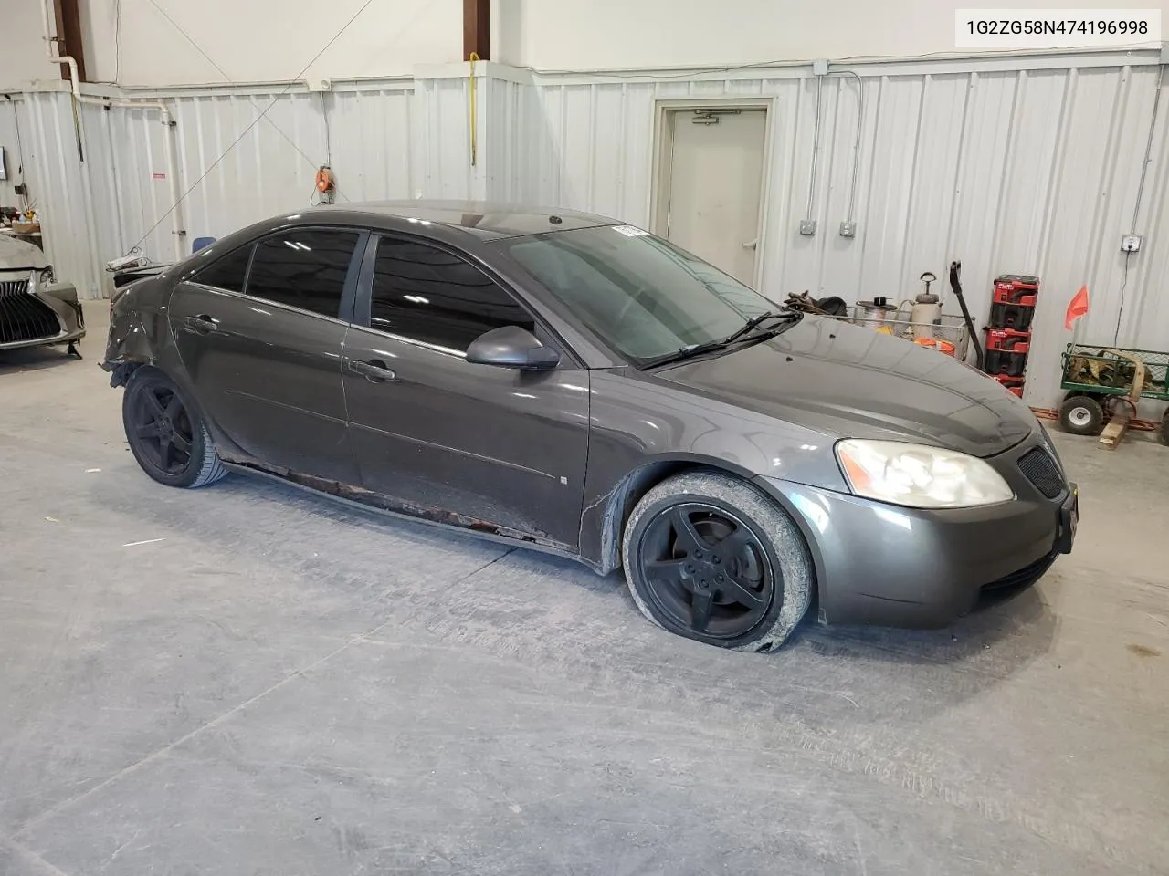 2007 Pontiac G6 Base VIN: 1G2ZG58N474196998 Lot: 75717904