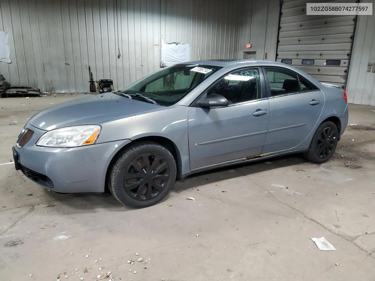 2007 Pontiac G6 Base VIN: 1G2ZG58B074277597 Lot: 77795774