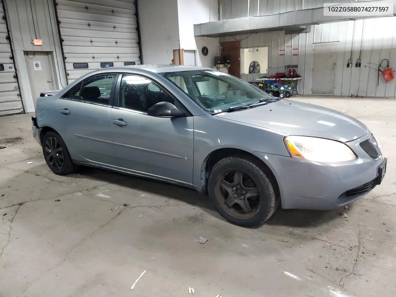 2007 Pontiac G6 Base VIN: 1G2ZG58B074277597 Lot: 77795774