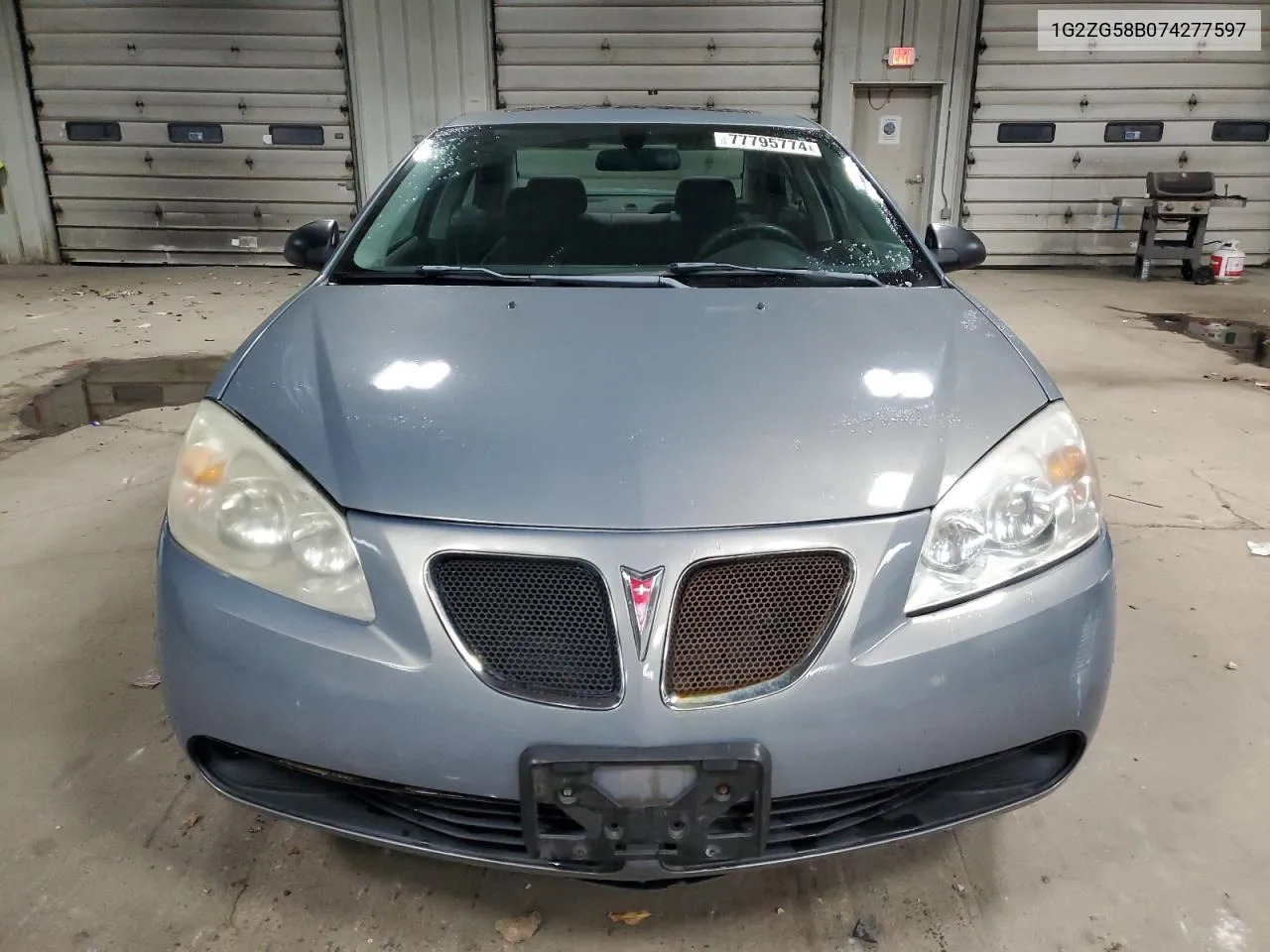 2007 Pontiac G6 Base VIN: 1G2ZG58B074277597 Lot: 77795774