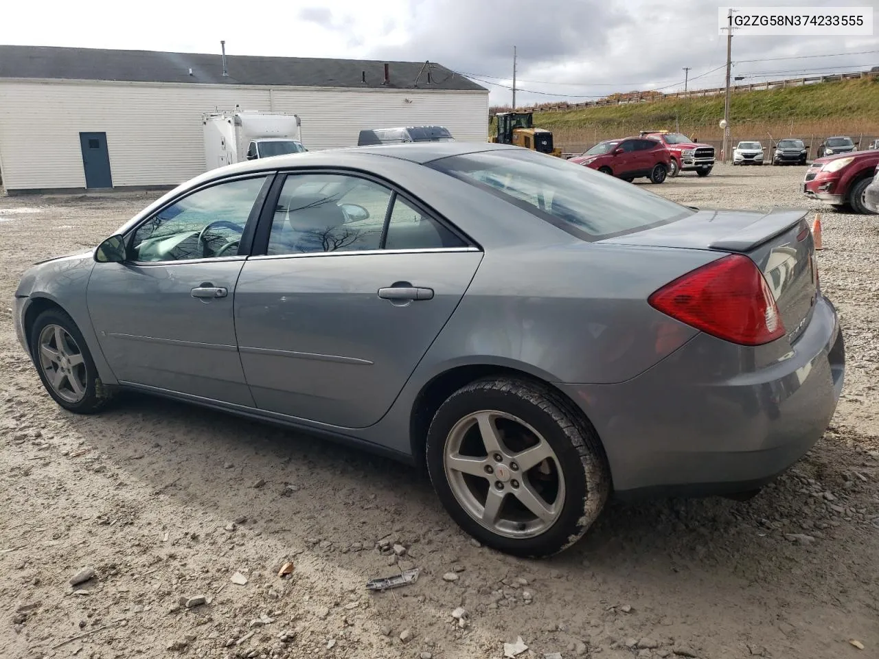 2007 Pontiac G6 Base VIN: 1G2ZG58N374233555 Lot: 77983444