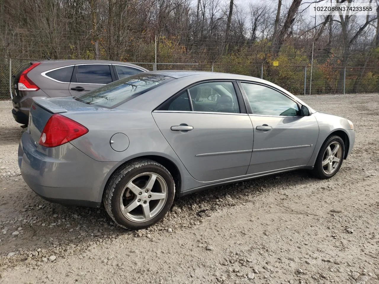 2007 Pontiac G6 Base VIN: 1G2ZG58N374233555 Lot: 77983444