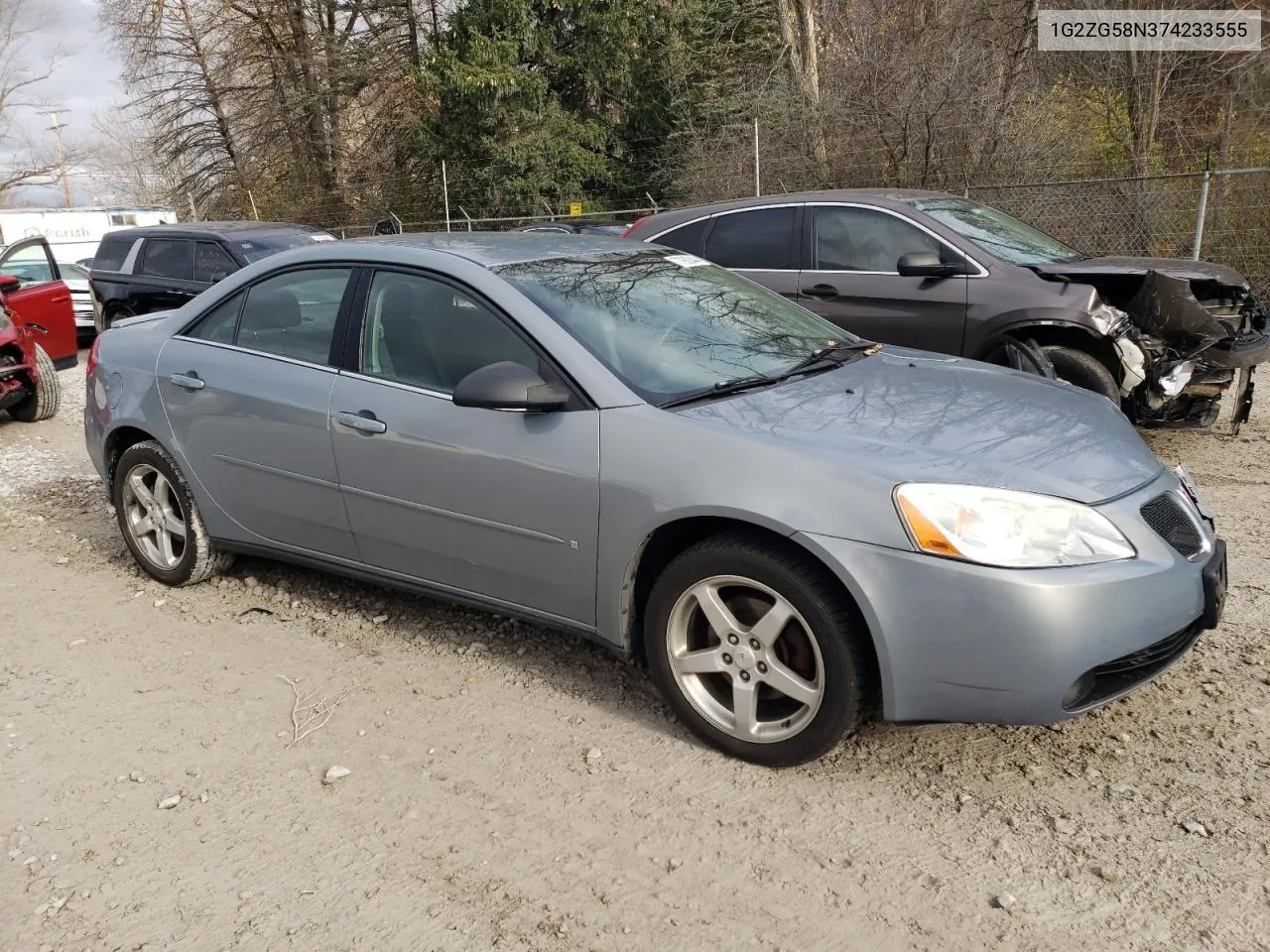 2007 Pontiac G6 Base VIN: 1G2ZG58N374233555 Lot: 77983444