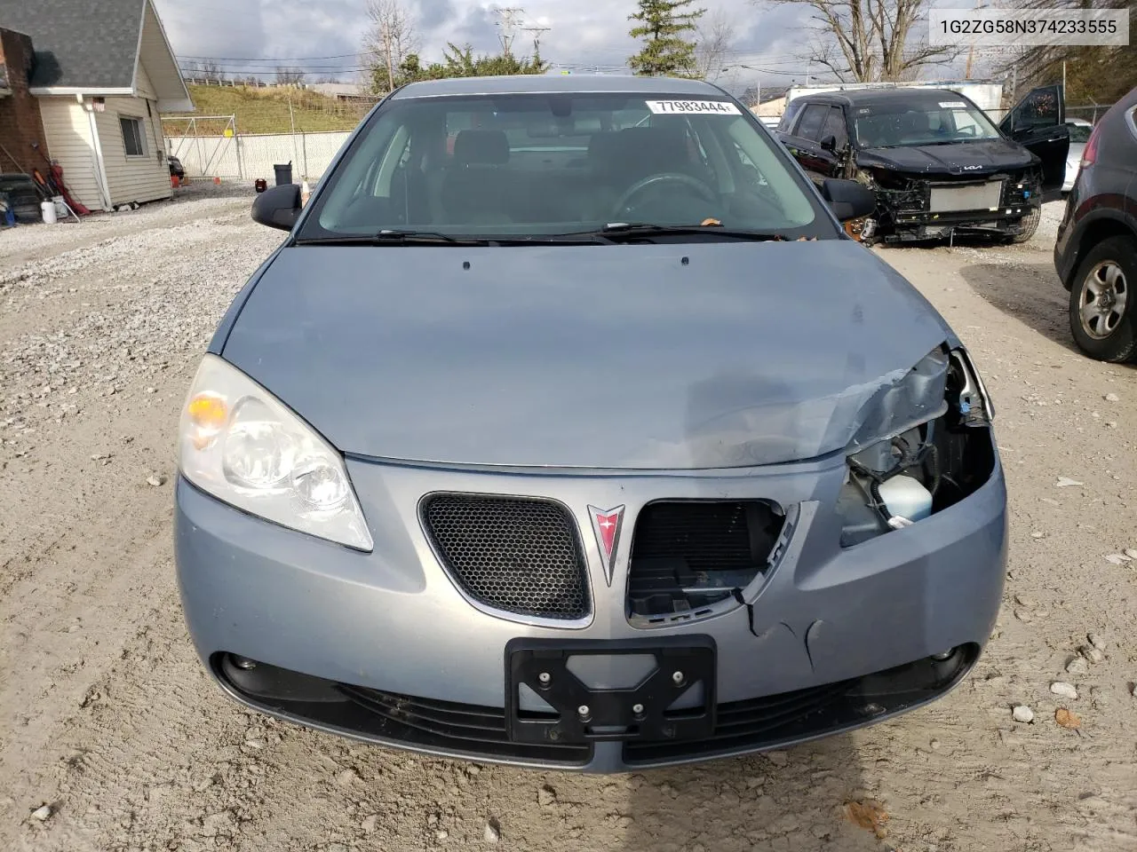 2007 Pontiac G6 Base VIN: 1G2ZG58N374233555 Lot: 77983444