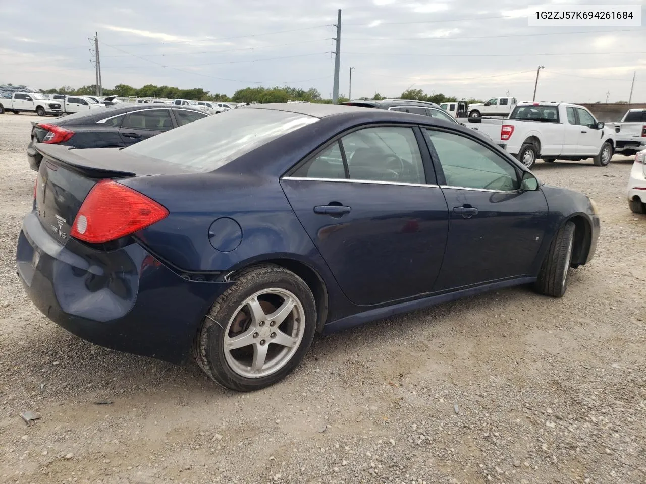 2009 Pontiac G6 VIN: 1G2ZJ57K694261684 Lot: 72351064