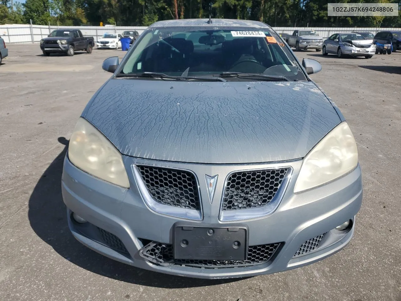 2009 Pontiac G6 VIN: 1G2ZJ57K694248806 Lot: 74628434