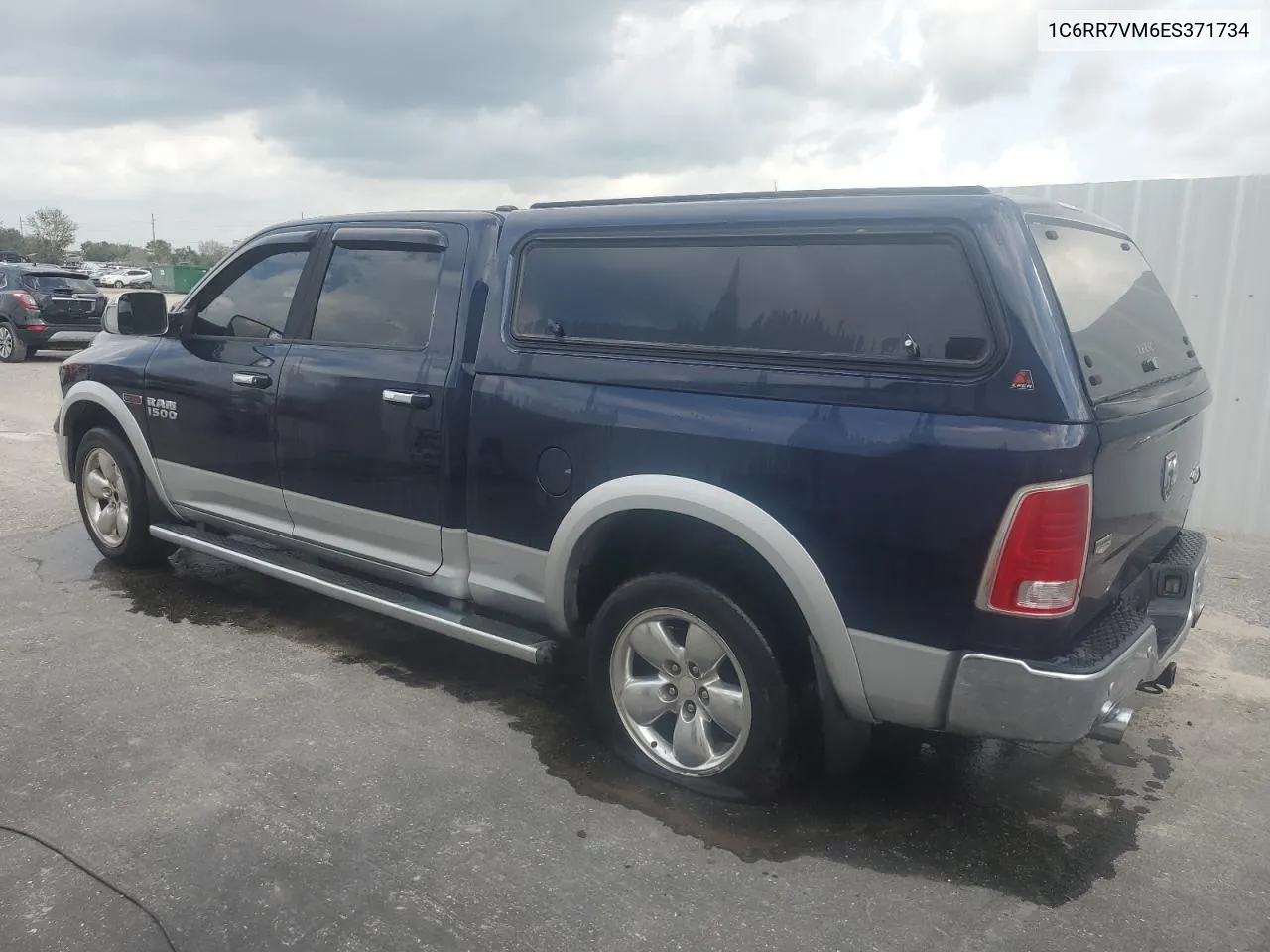 2014 Ram 1500 Laramie VIN: 1C6RR7VM6ES371734 Lot: 65869984