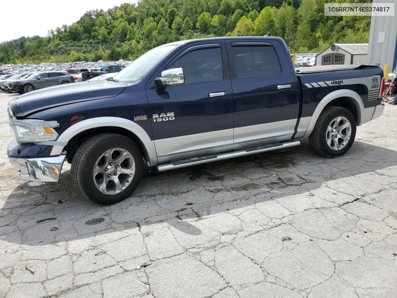 2014 Ram 1500 Laramie VIN: 1C6RR7NT4ES374817 Lot: 70149394