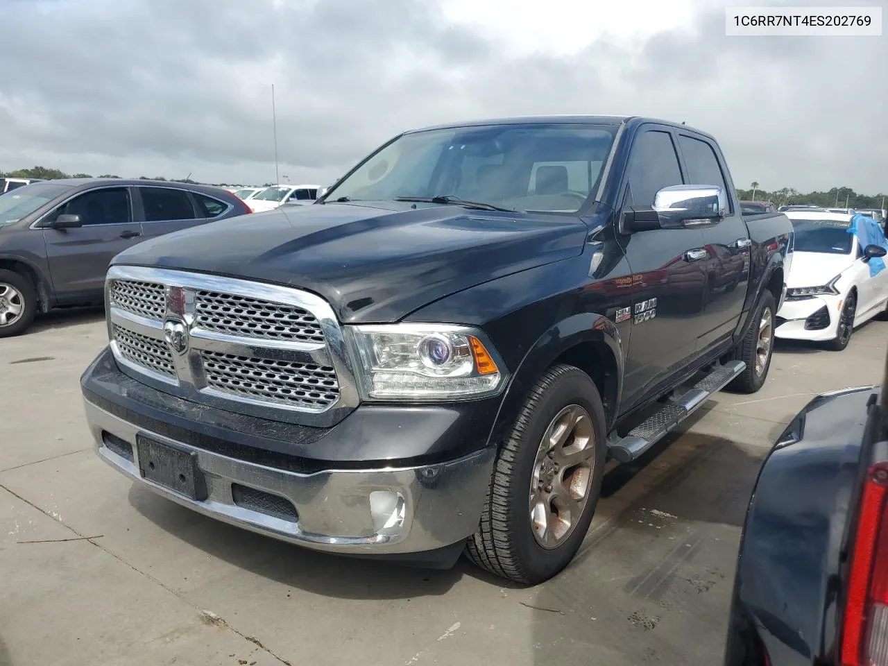 2014 Ram 1500 Laramie VIN: 1C6RR7NT4ES202769 Lot: 74666864