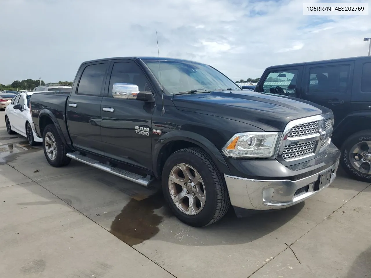 2014 Ram 1500 Laramie VIN: 1C6RR7NT4ES202769 Lot: 74666864