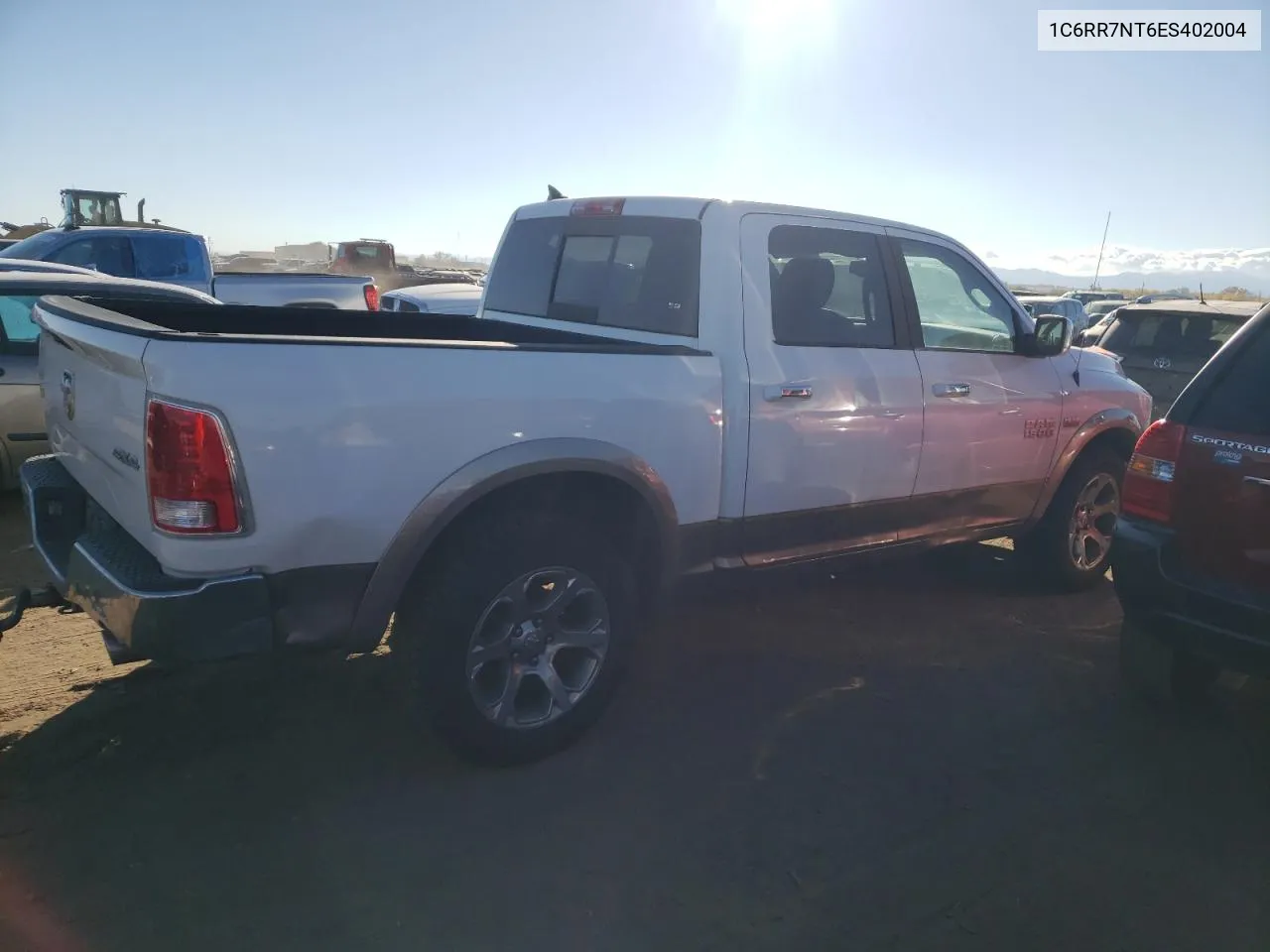 2014 Ram 1500 Laramie VIN: 1C6RR7NT6ES402004 Lot: 76496304