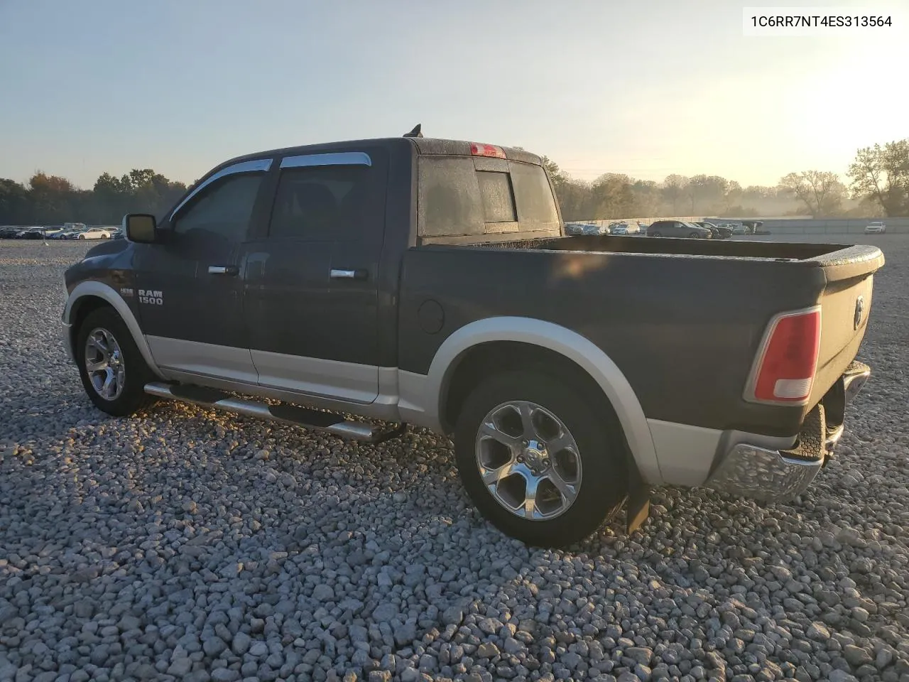 2014 Ram 1500 Laramie VIN: 1C6RR7NT4ES313564 Lot: 76762764