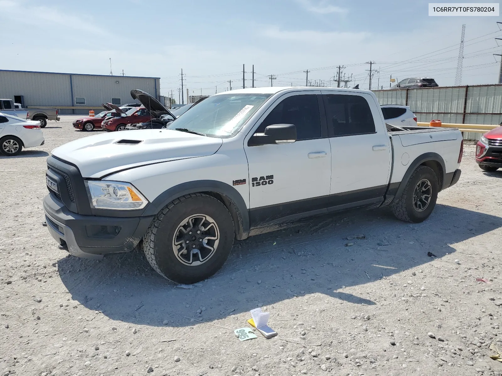 2015 Ram 1500 Rebel VIN: 1C6RR7YT0FS780204 Lot: 63282694