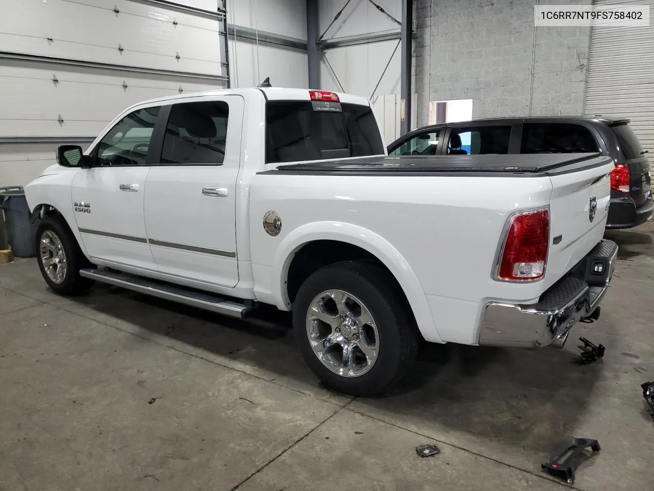 2015 Ram 1500 Laramie VIN: 1C6RR7NT9FS758402 Lot: 69855444