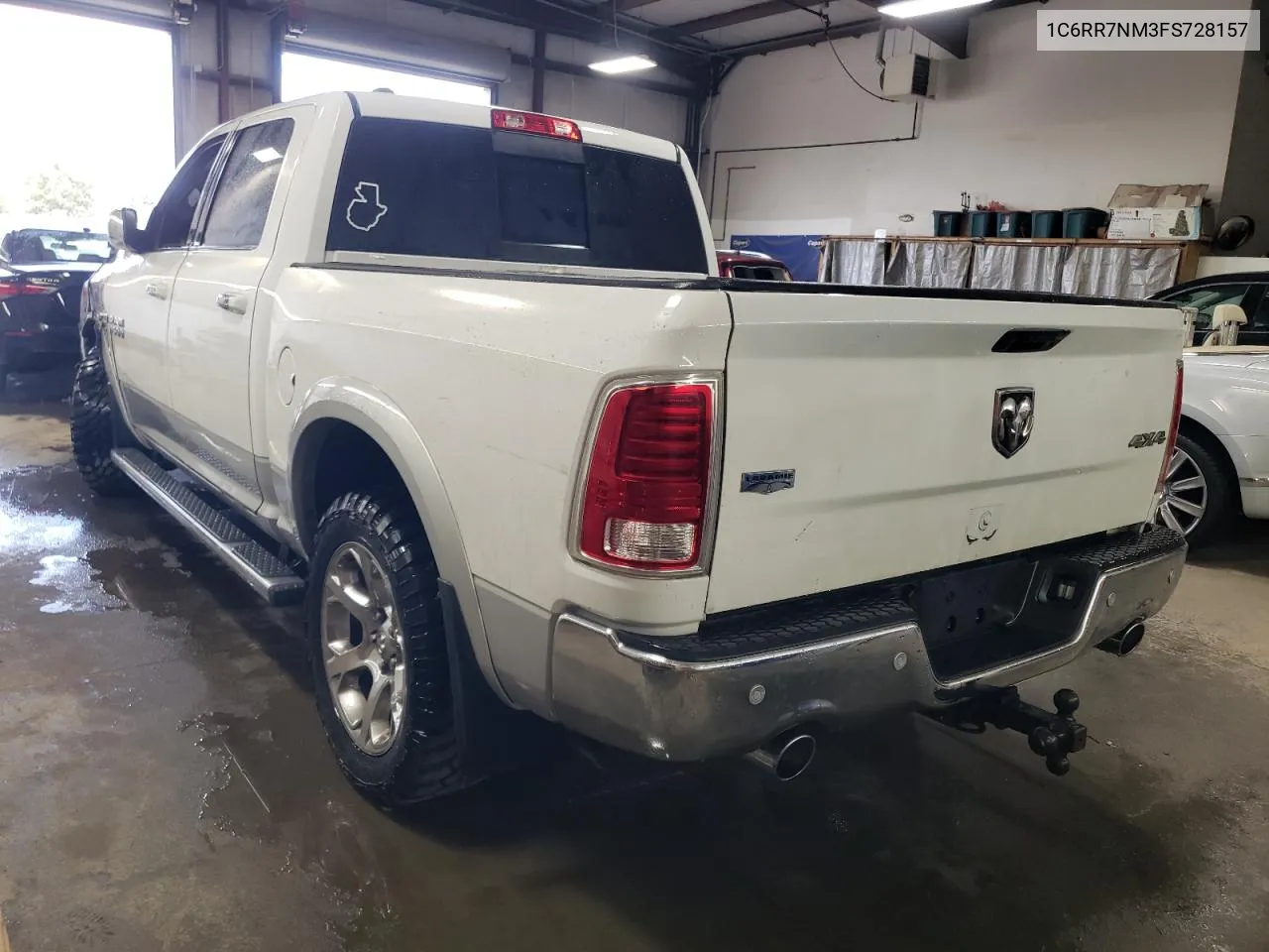 2015 Ram 1500 Laramie VIN: 1C6RR7NM3FS728157 Lot: 69998234