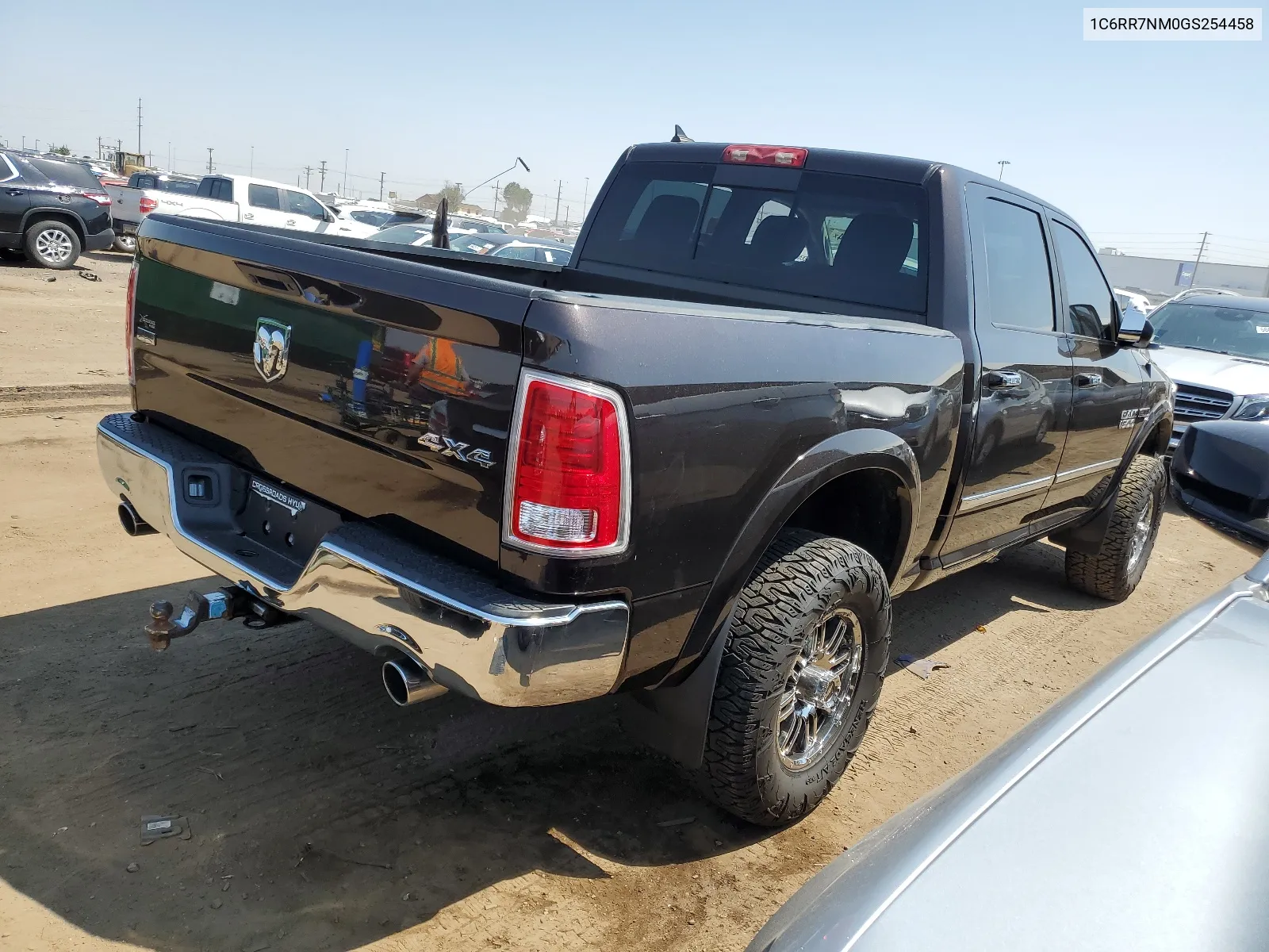 2016 Ram 1500 Laramie VIN: 1C6RR7NM0GS254458 Lot: 65468344