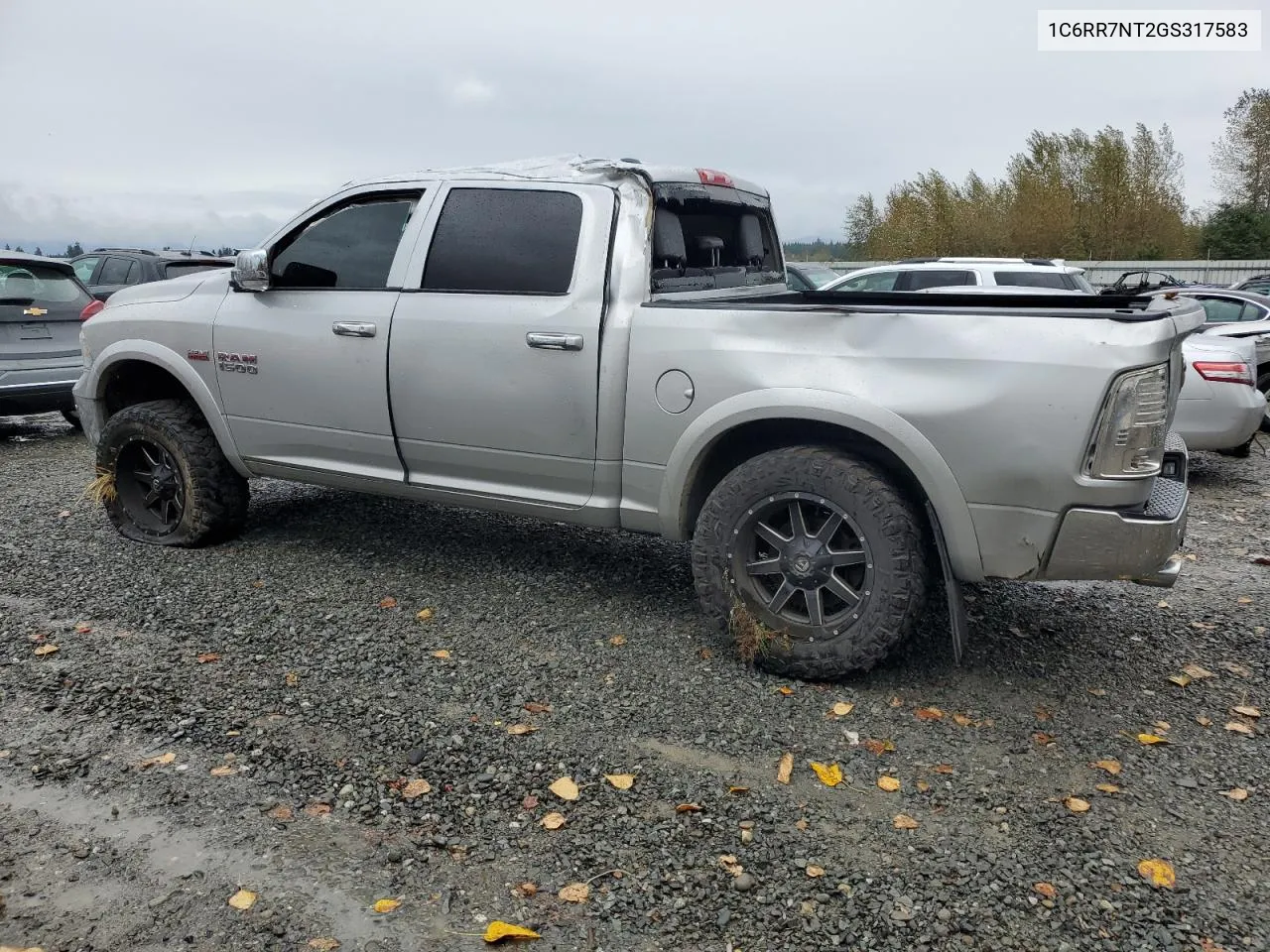 2016 Ram 1500 Laramie VIN: 1C6RR7NT2GS317583 Lot: 73054994