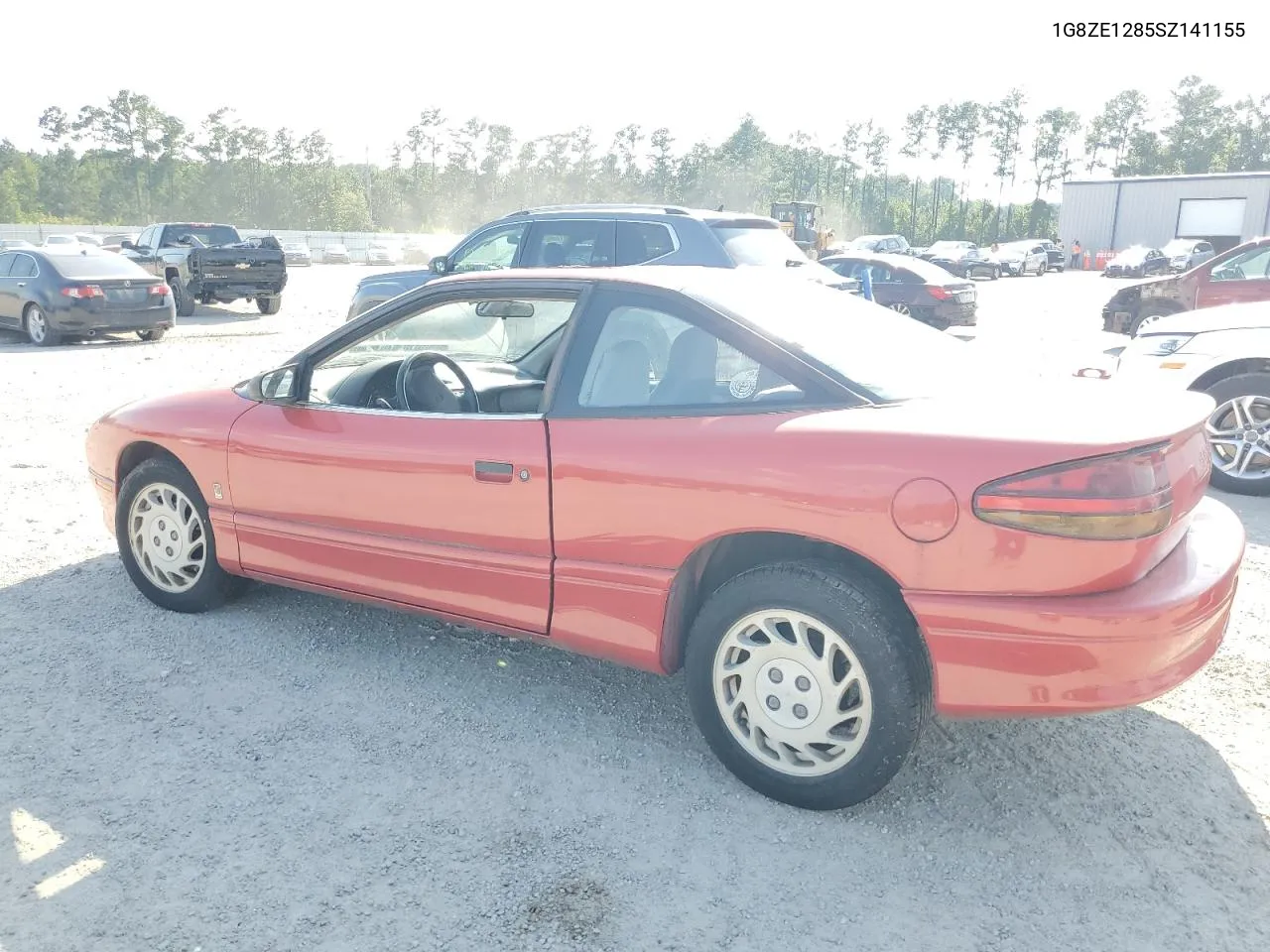 1995 Saturn Sc1 VIN: 1G8ZE1285SZ141155 Lot: 65757374