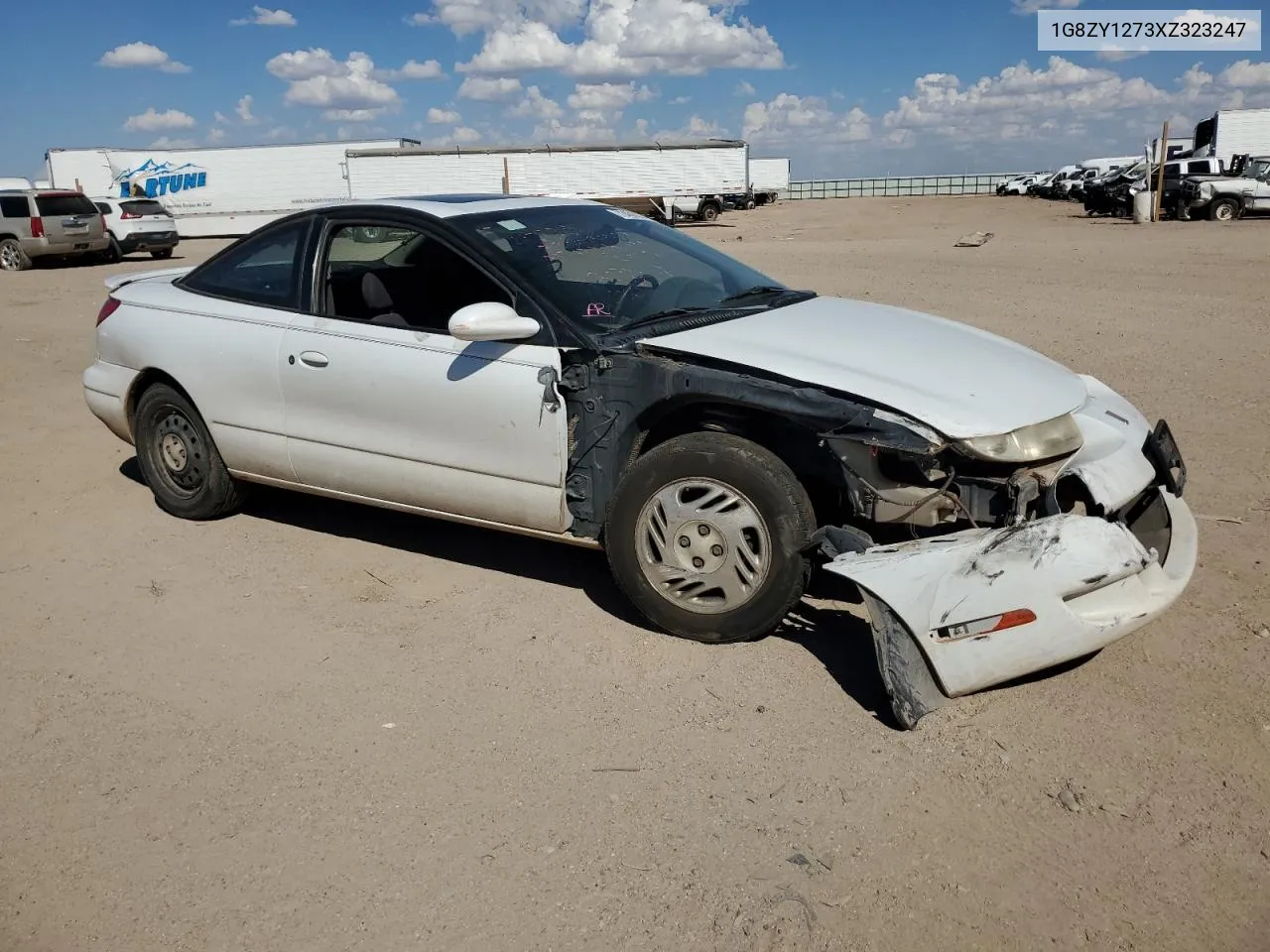 1999 Saturn Sc2 VIN: 1G8ZY1273XZ323247 Lot: 72400924