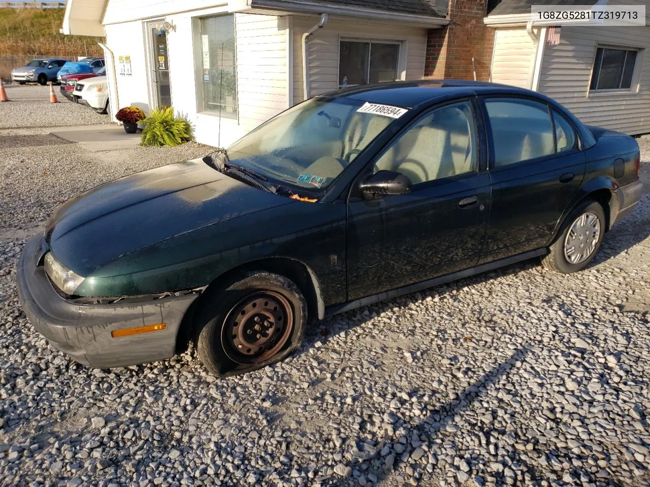 1996 Saturn Sl1 VIN: 1G8ZG5281TZ319713 Lot: 77186594