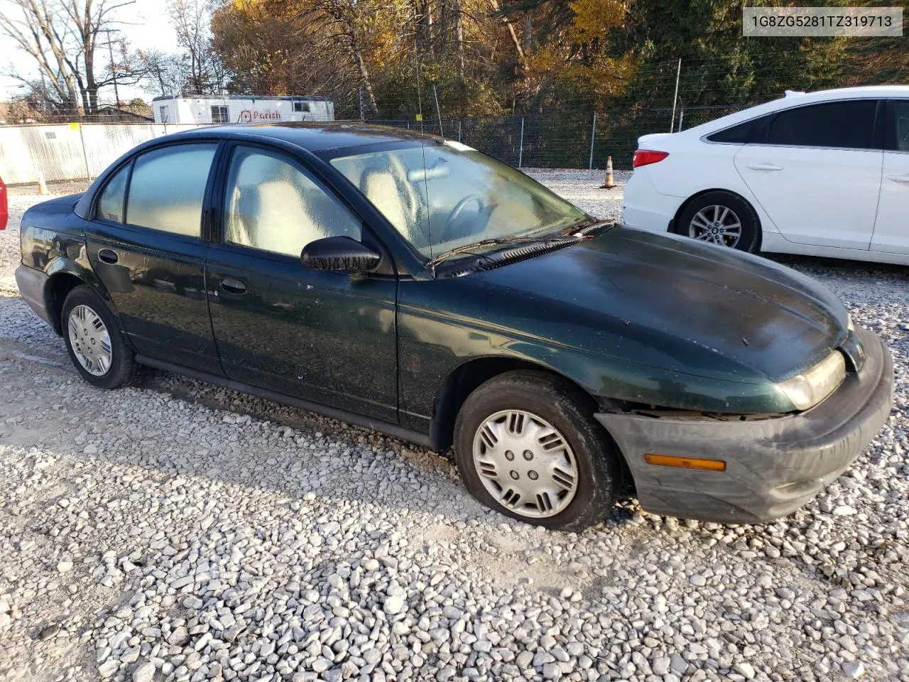 1996 Saturn Sl1 VIN: 1G8ZG5281TZ319713 Lot: 77186594