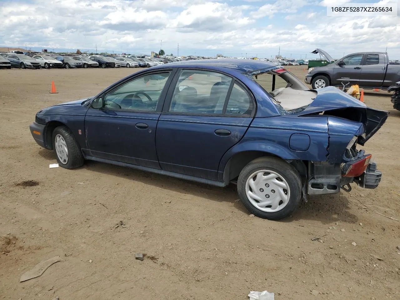 1999 Saturn Sl VIN: 1G8ZF5287XZ265634 Lot: 55973834