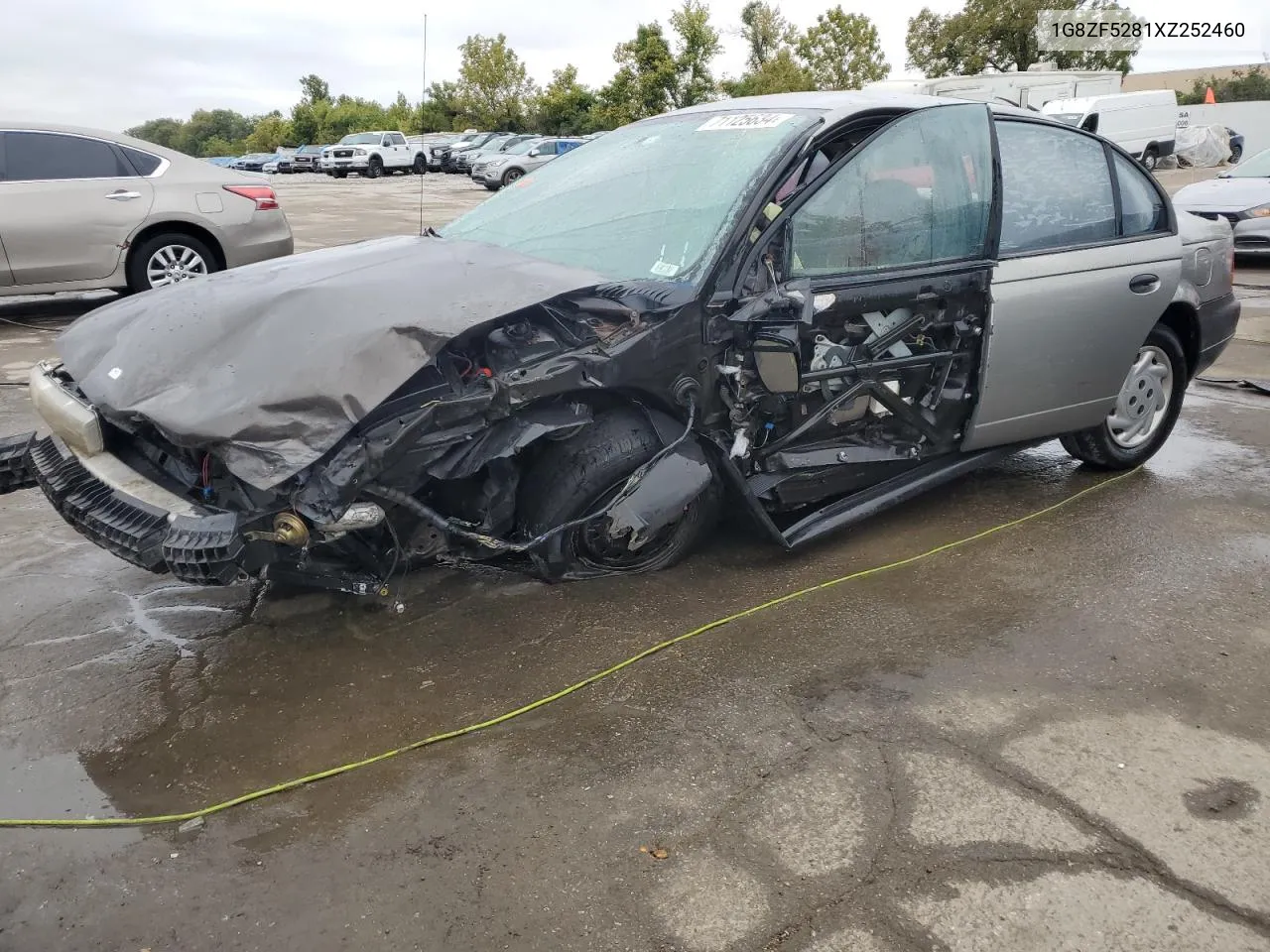 1999 Saturn Sl VIN: 1G8ZF5281XZ252460 Lot: 71125634