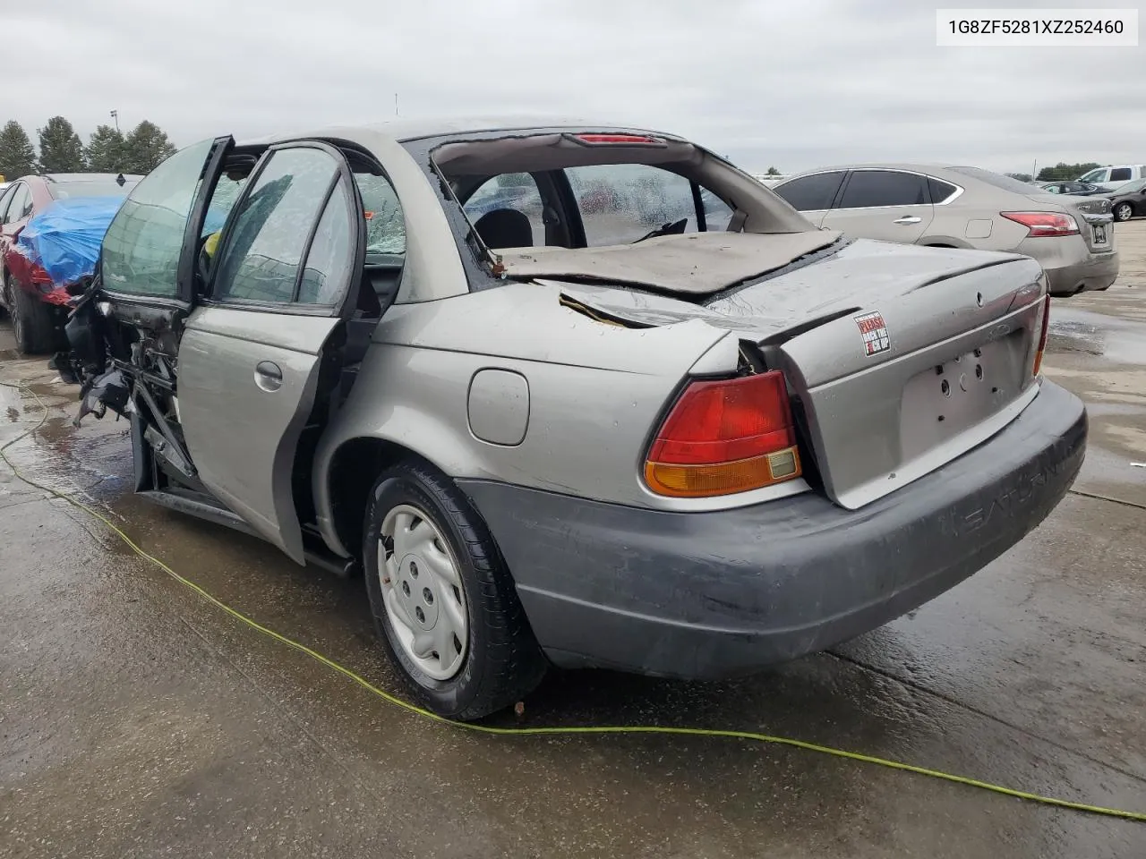 1999 Saturn Sl VIN: 1G8ZF5281XZ252460 Lot: 71125634