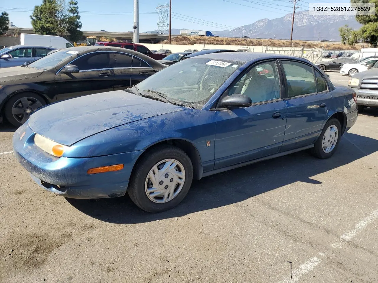 2001 Saturn Sl VIN: 1G8ZF52861Z275529 Lot: 74153154