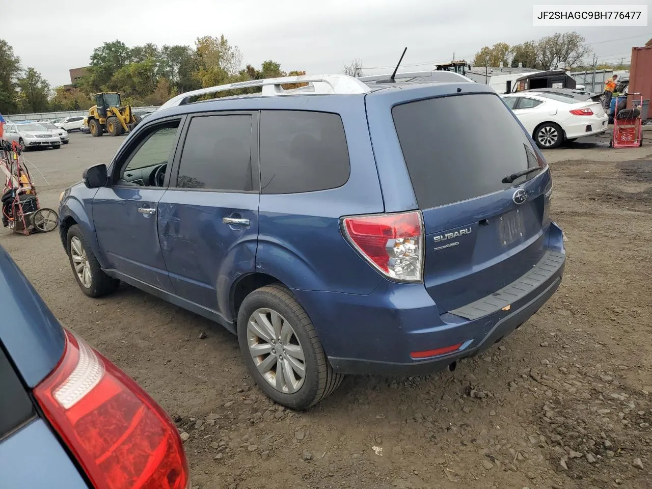 2011 Subaru Forester Touring VIN: JF2SHAGC9BH776477 Lot: 75716374