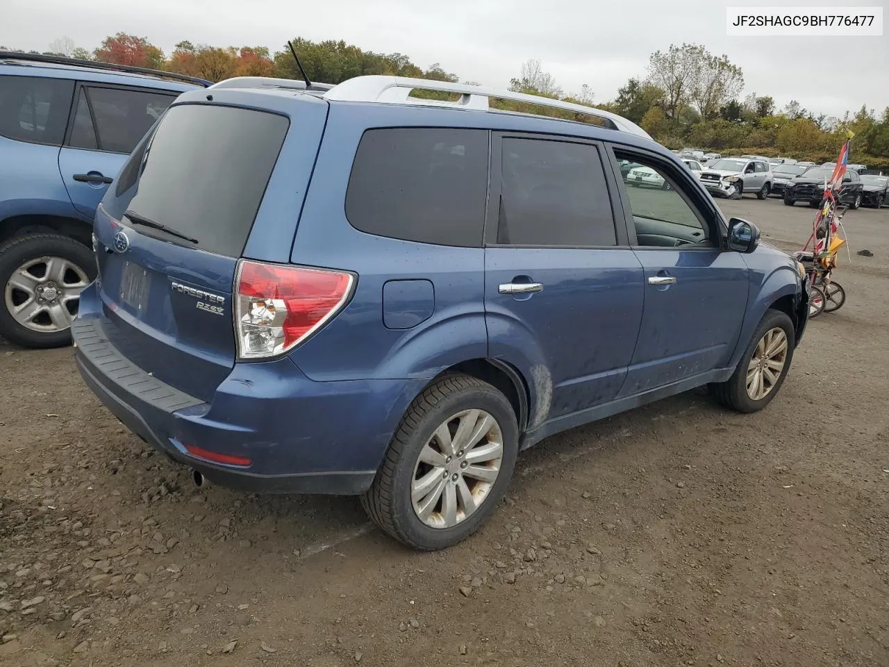 2011 Subaru Forester Touring VIN: JF2SHAGC9BH776477 Lot: 75716374