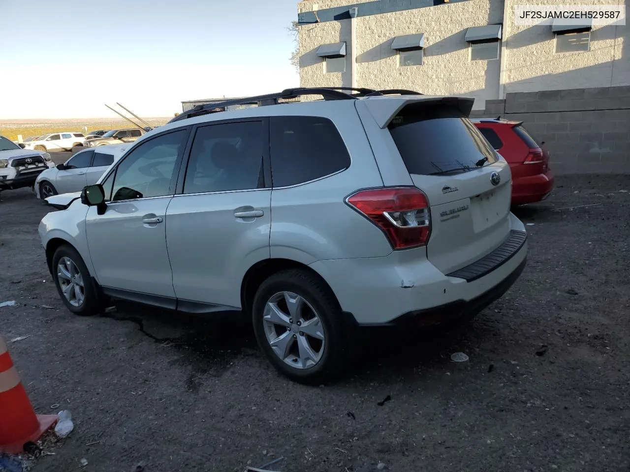 2014 Subaru Forester 2.5I Touring VIN: JF2SJAMC2EH529587 Lot: 76415504