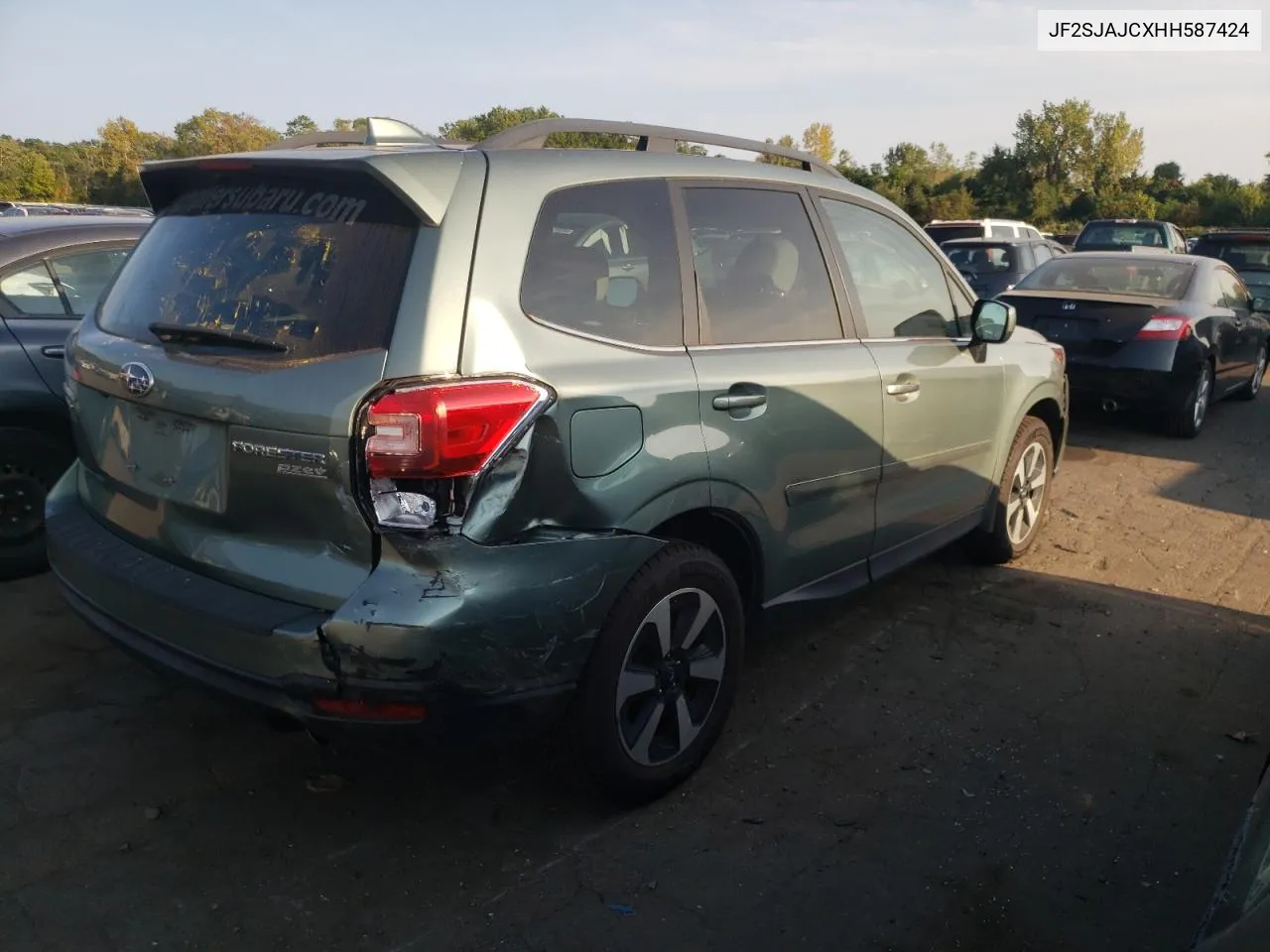 2017 Subaru Forester 2.5I Limited VIN: JF2SJAJCXHH587424 Lot: 70982674