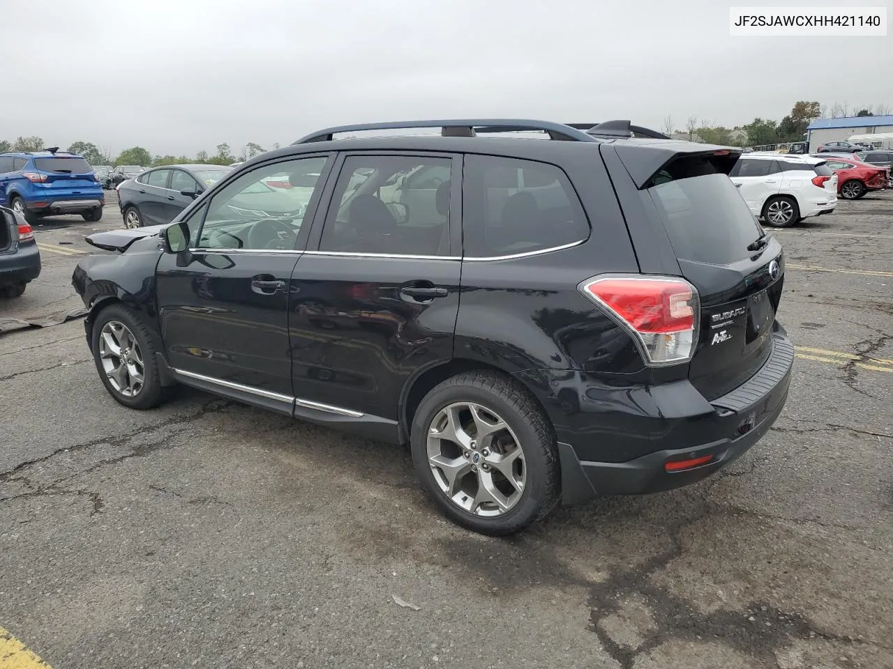 2017 Subaru Forester 2.5I Touring VIN: JF2SJAWCXHH421140 Lot: 73165534