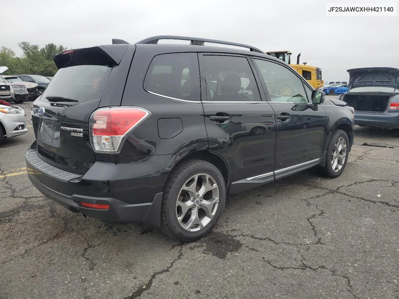 2017 Subaru Forester 2.5I Touring VIN: JF2SJAWCXHH421140 Lot: 73165534