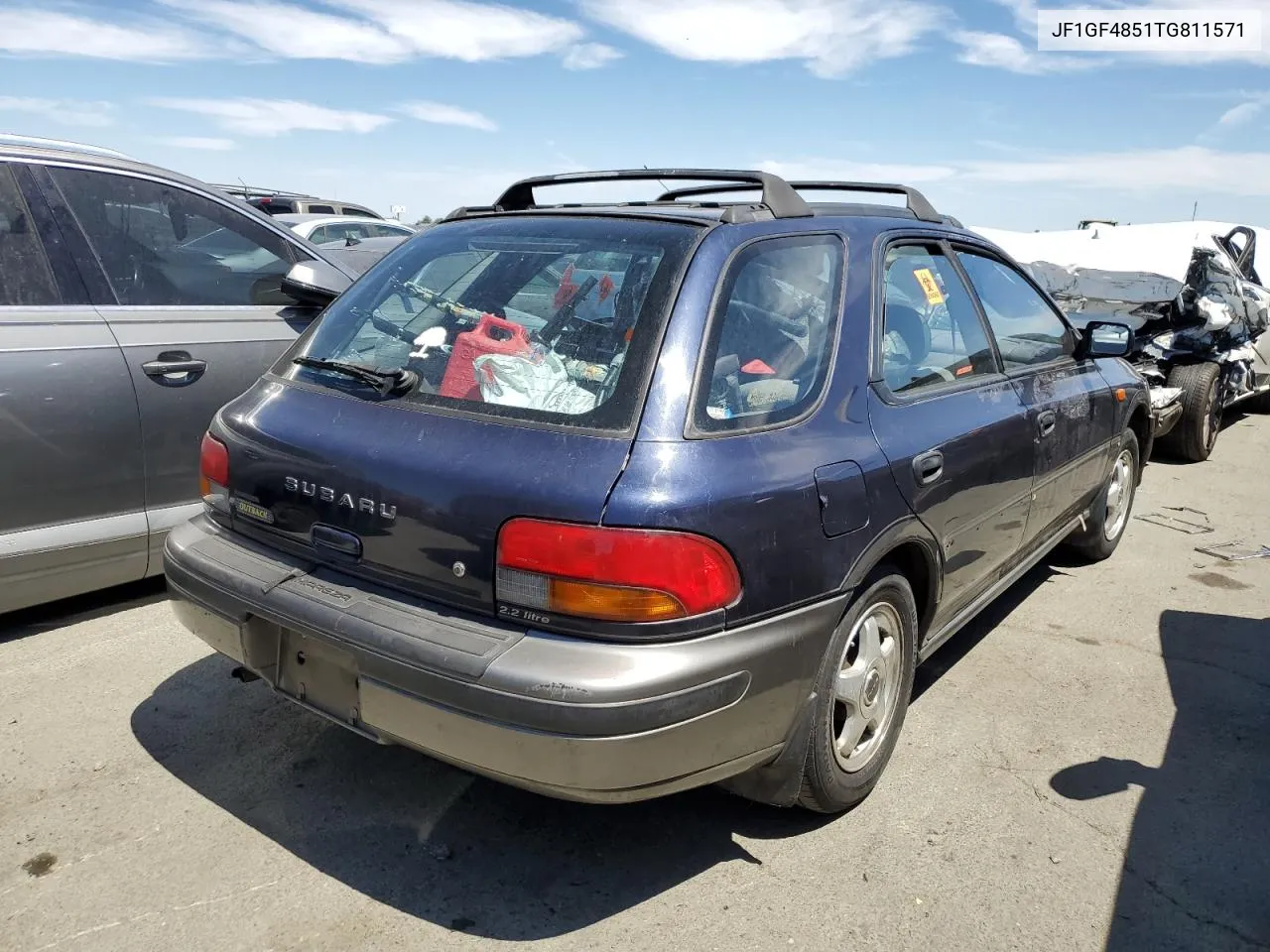 1996 Subaru Impreza Outback VIN: JF1GF4851TG811571 Lot: 65650514