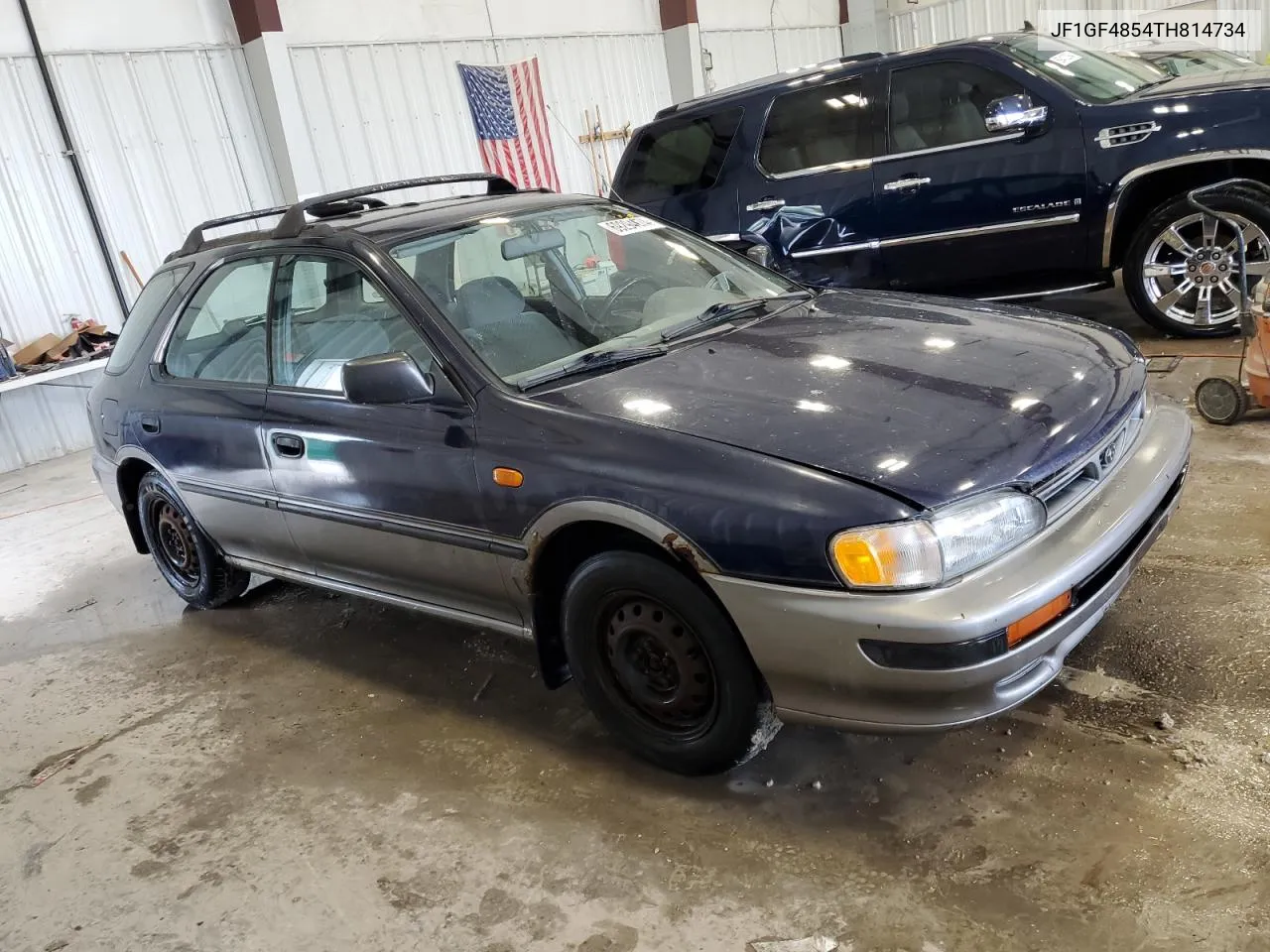 1996 Subaru Impreza Outback VIN: JF1GF4854TH814734 Lot: 69294674