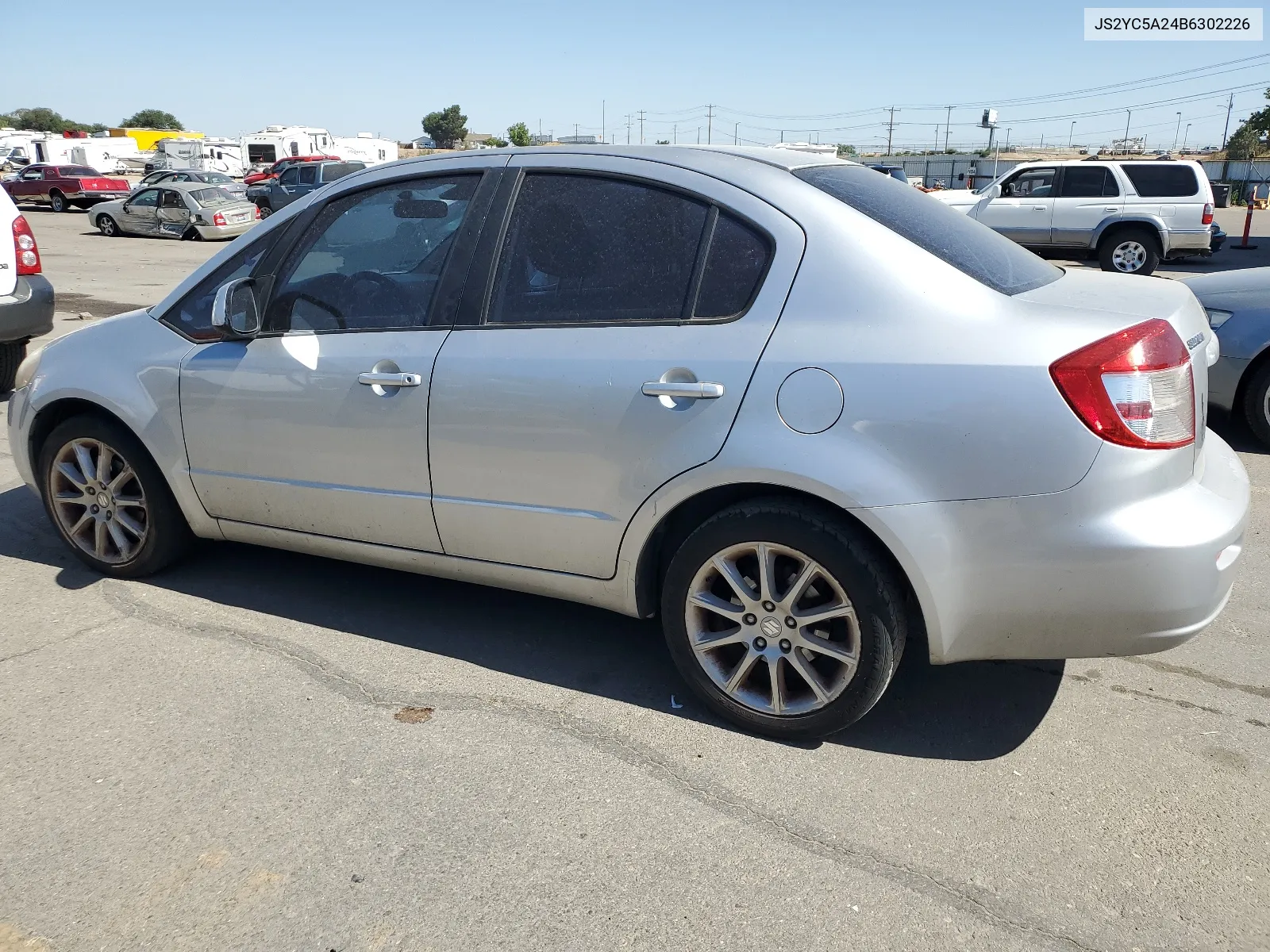 2011 Suzuki Sx4 Le VIN: JS2YC5A24B6302226 Lot: 67797154