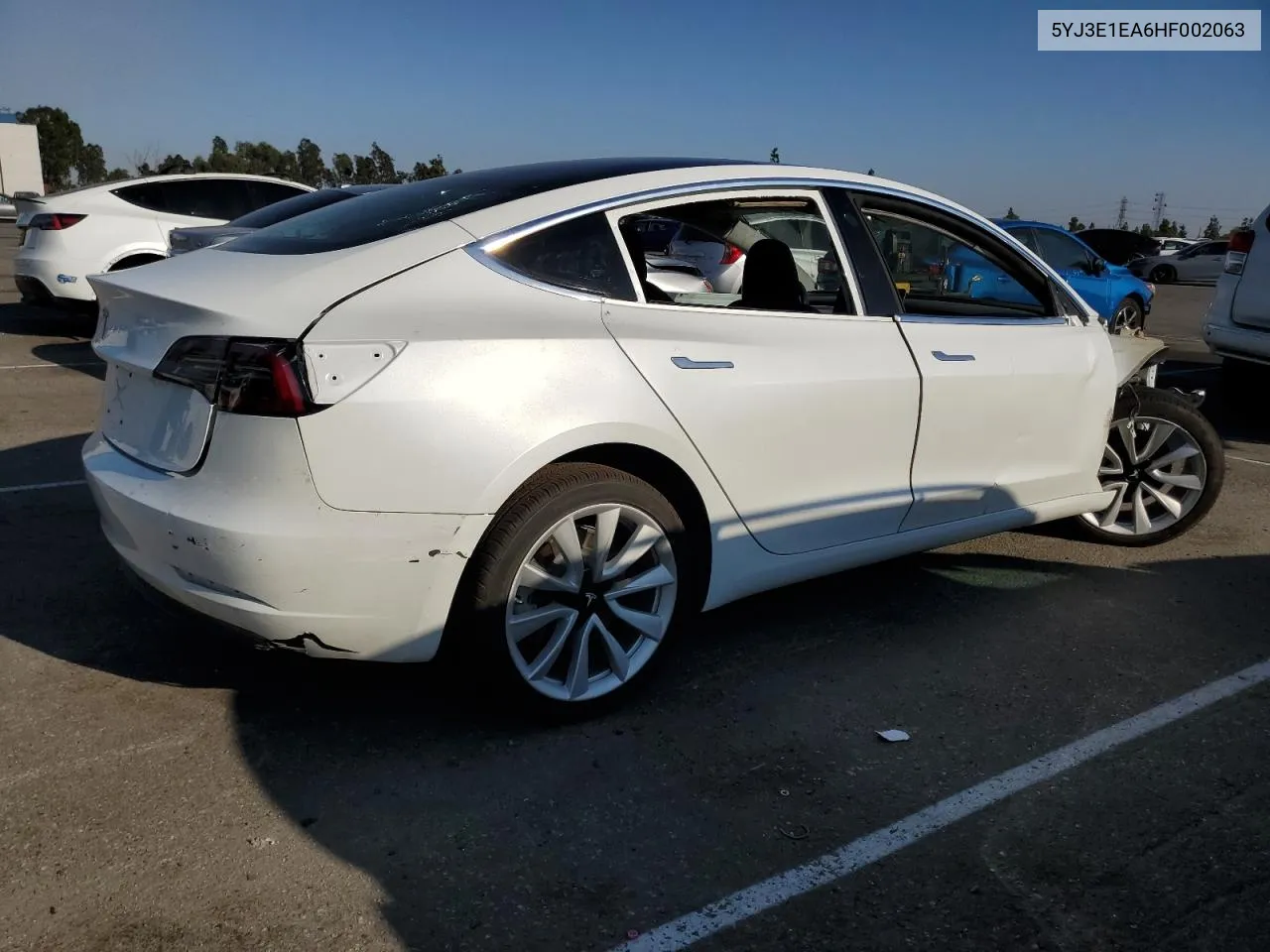 2017 Tesla Model 3 VIN: 5YJ3E1EA6HF002063 Lot: 73403854