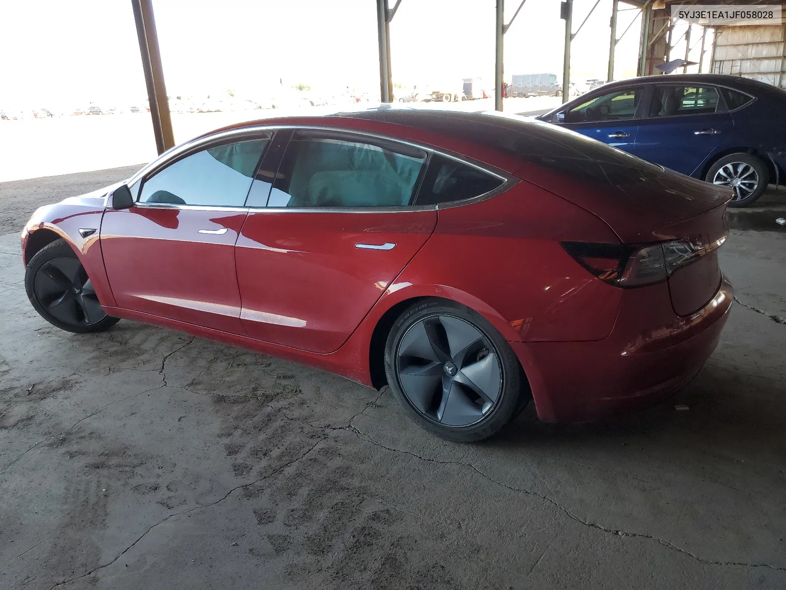 2018 Tesla Model 3 VIN: 5YJ3E1EA1JF058028 Lot: 60937864