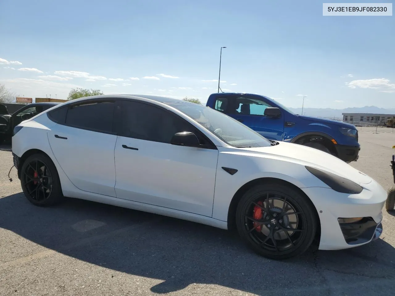 2018 Tesla Model 3 VIN: 5YJ3E1EB9JF082330 Lot: 69235374