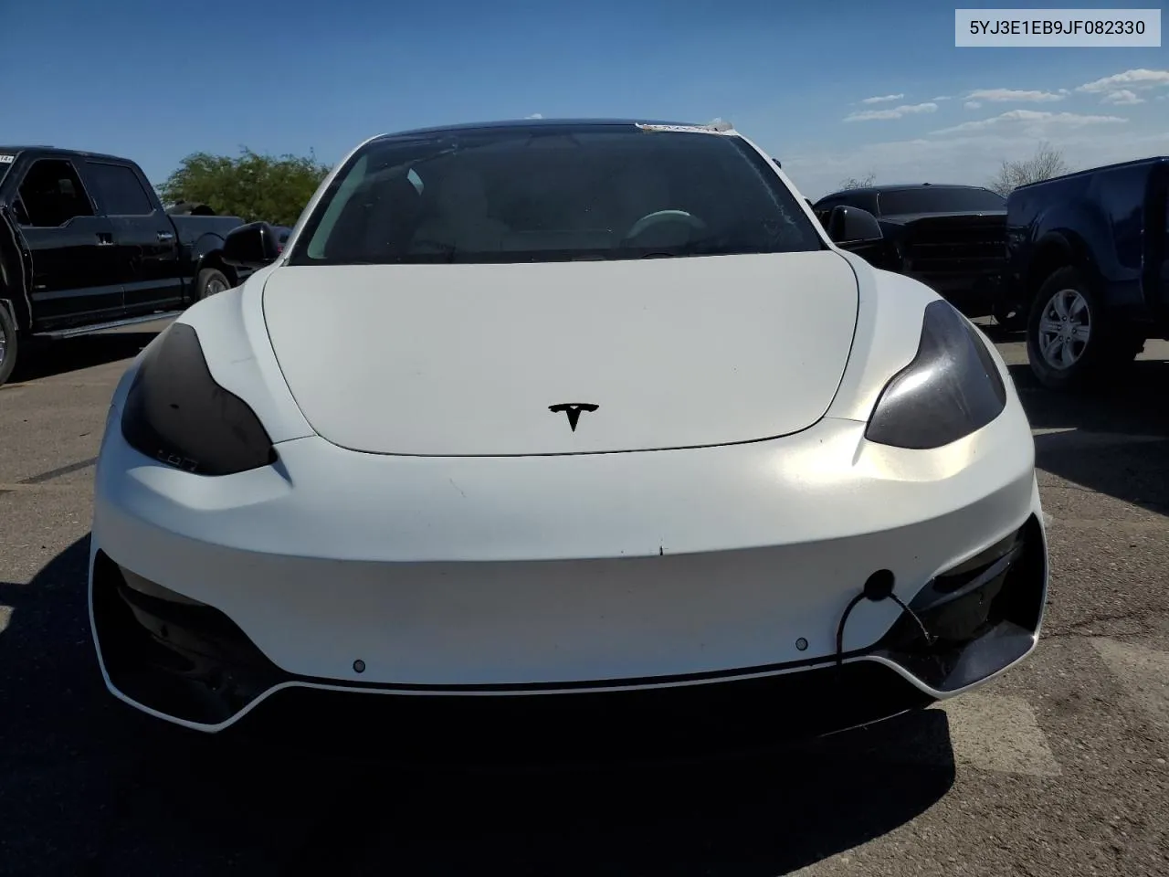 2018 Tesla Model 3 VIN: 5YJ3E1EB9JF082330 Lot: 69235374