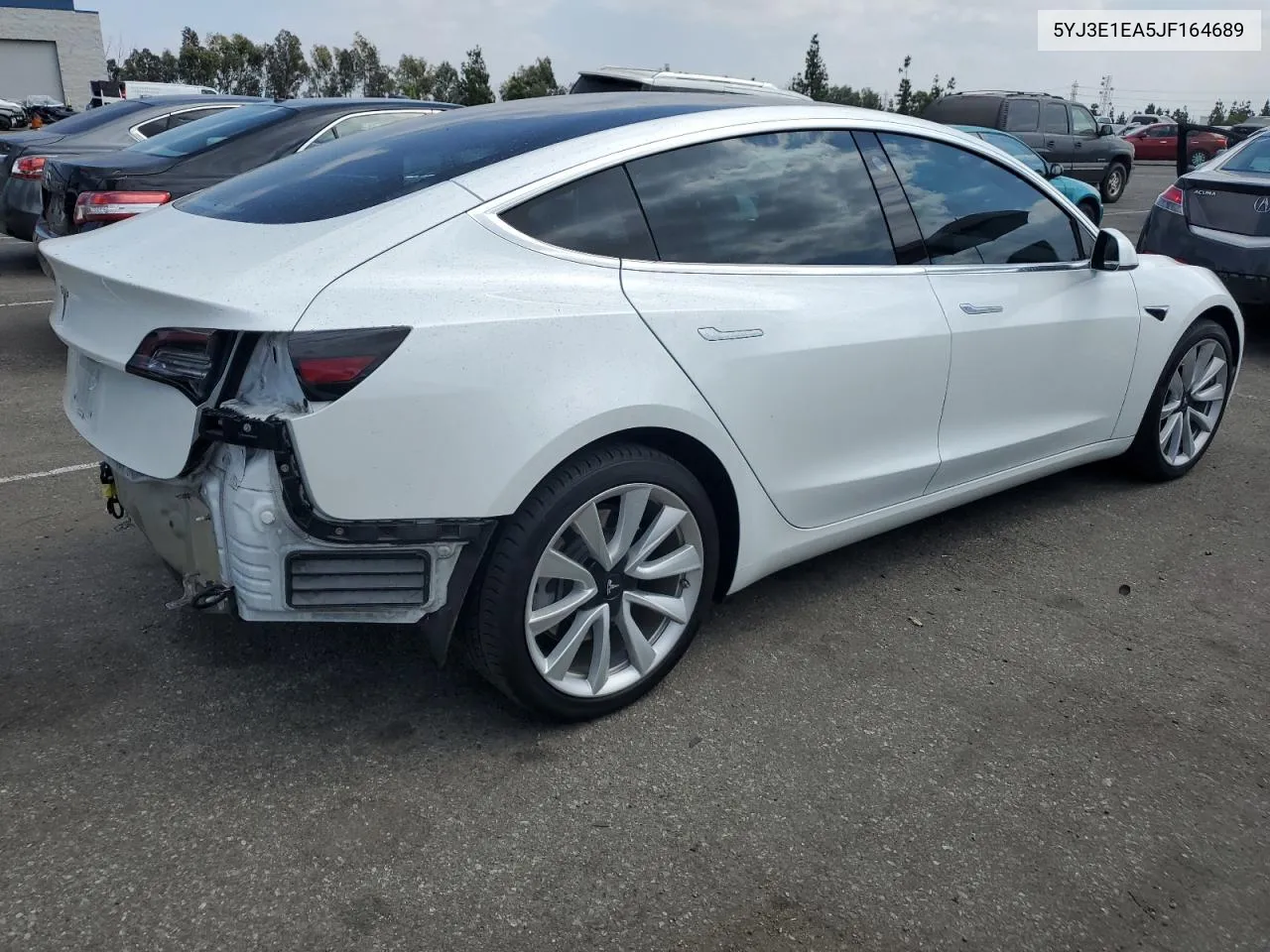 2018 Tesla Model 3 VIN: 5YJ3E1EA5JF164689 Lot: 72463864