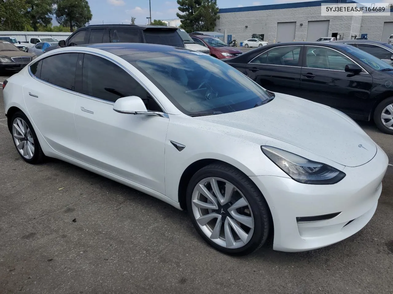 2018 Tesla Model 3 VIN: 5YJ3E1EA5JF164689 Lot: 72463864